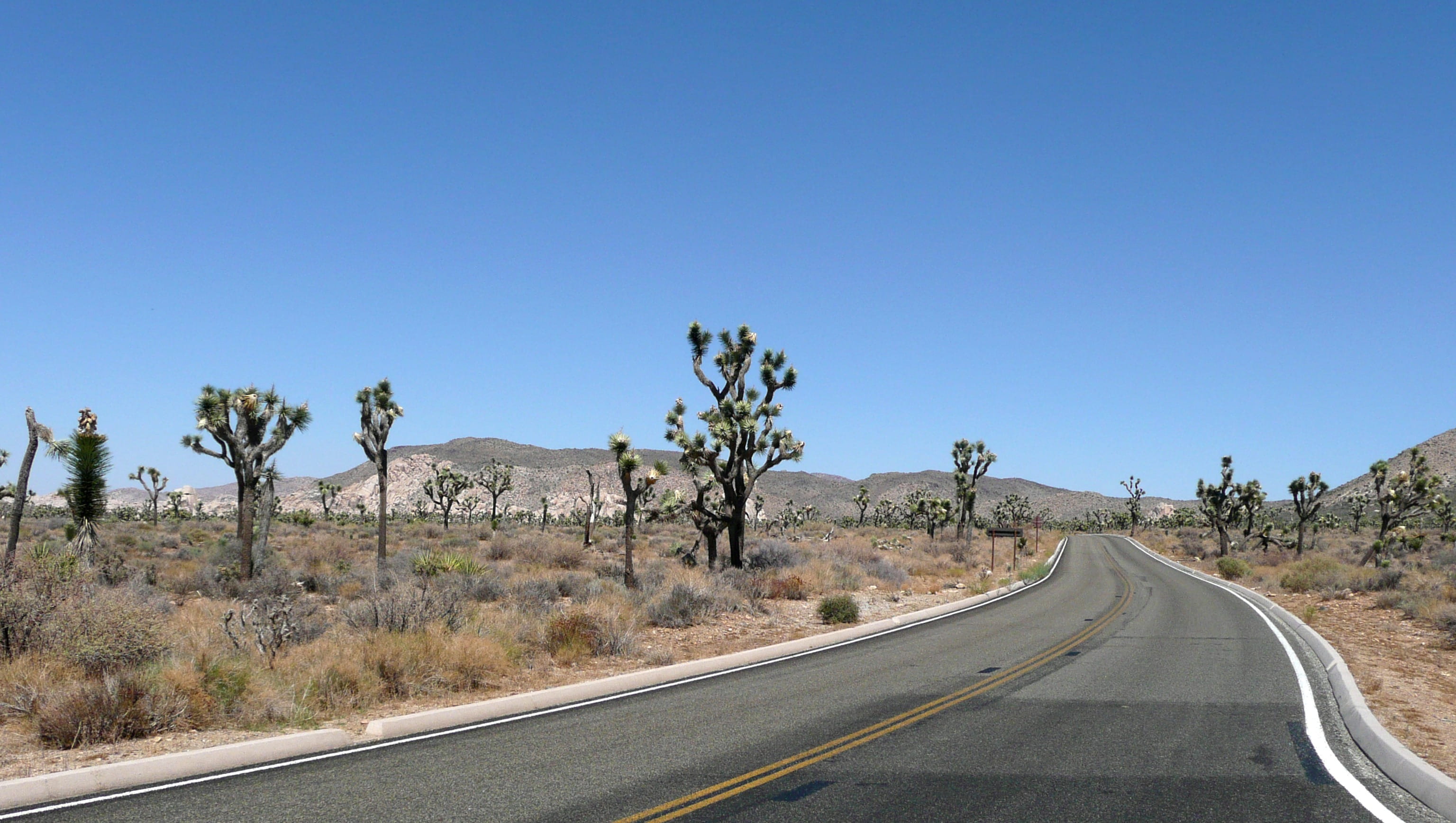 clear sky, dry, highway, sign, california, dust, desert road, travel Locations, direction, outdoors, tourist attraction, climate, diminishing perspective, HD Wallpaper