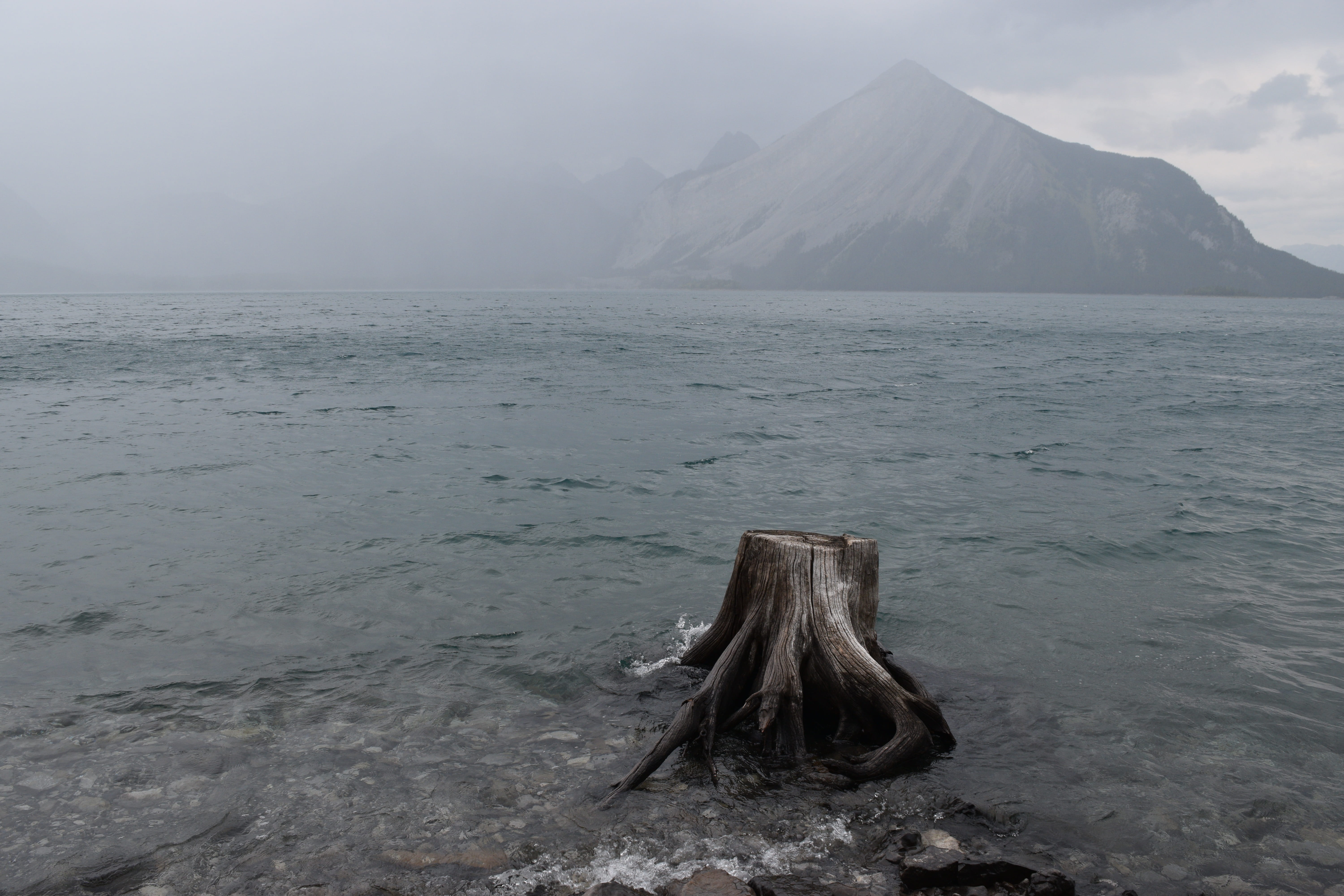 mountain, volcanic crater, mountain peak, fog, non-urban scene, land, volcano, kananaskis, smoke, outdoors, idyllic, lake, day, 5K, mist, no people, tranquility, HD Wallpaper
