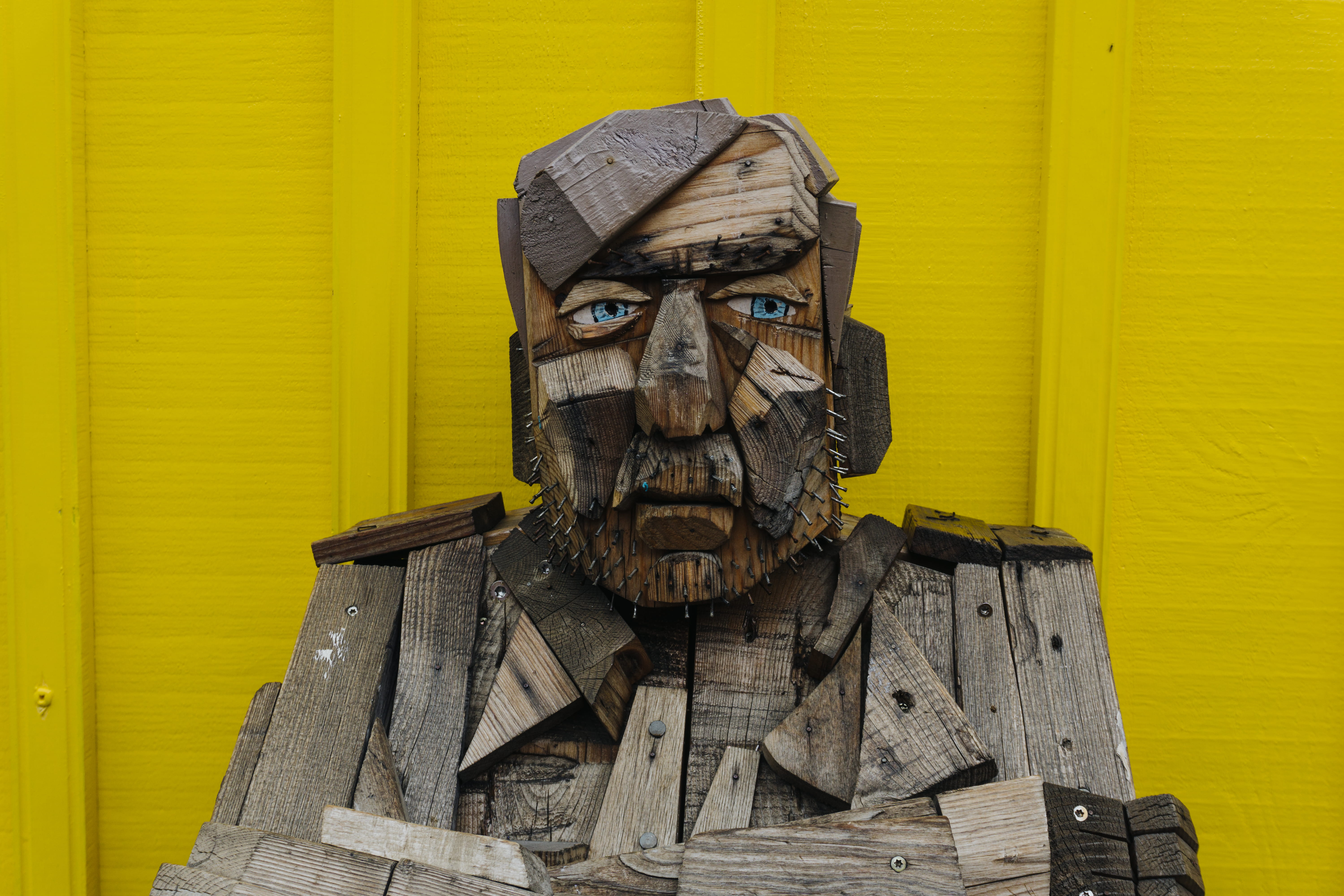people, man, close-up, carving, male likeness, installation, men, portrait, structure, wall - building feature, sculpture, wood, yellow, male, wooden, human representation, HD Wallpaper