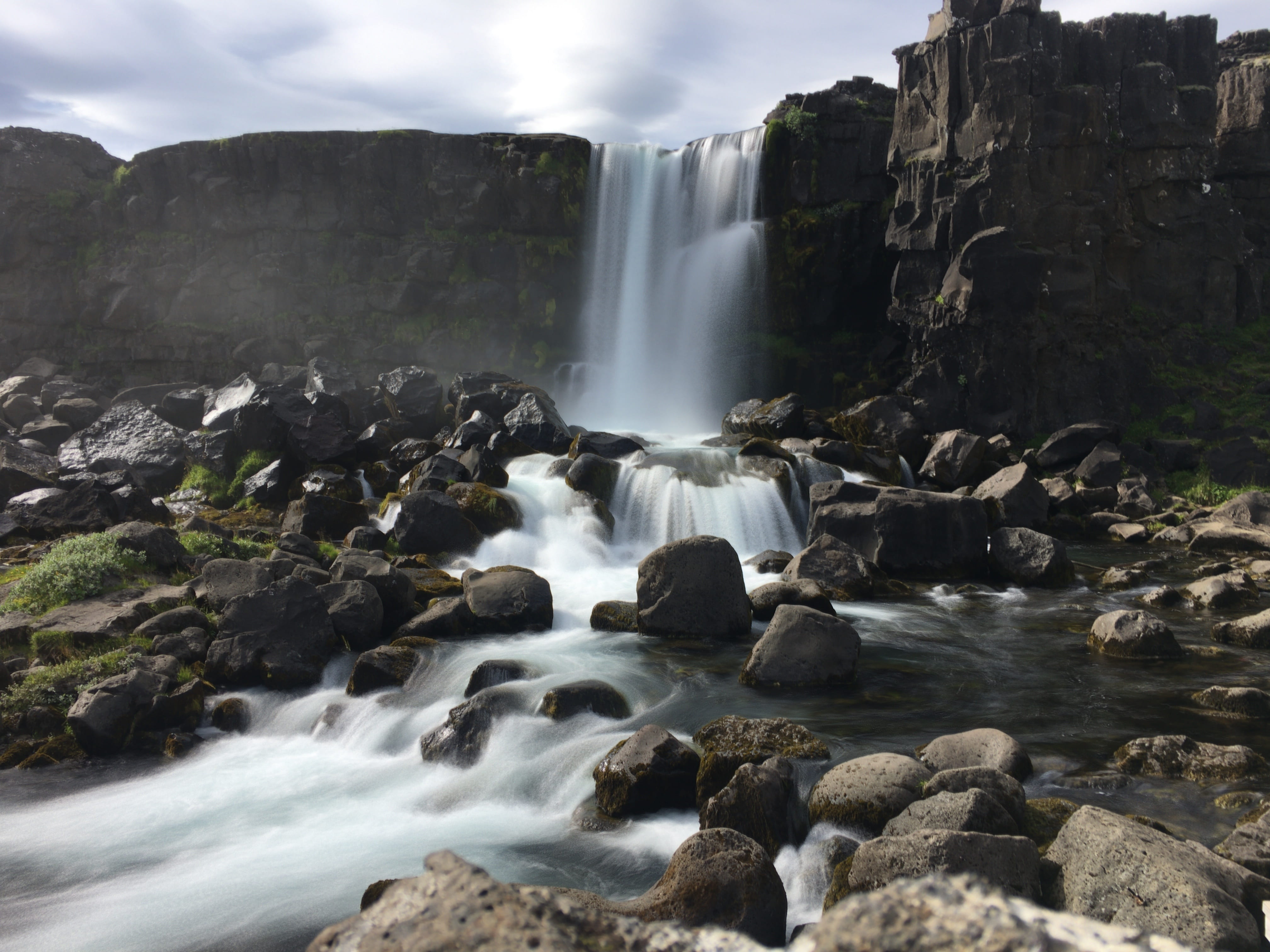 power in nature, flowing, motion, outdoor, blurred motion, flowing water, water, sea, nature, solid, rock, waterfall, outdoors, rock - object, beauty in nature, HD Wallpaper
