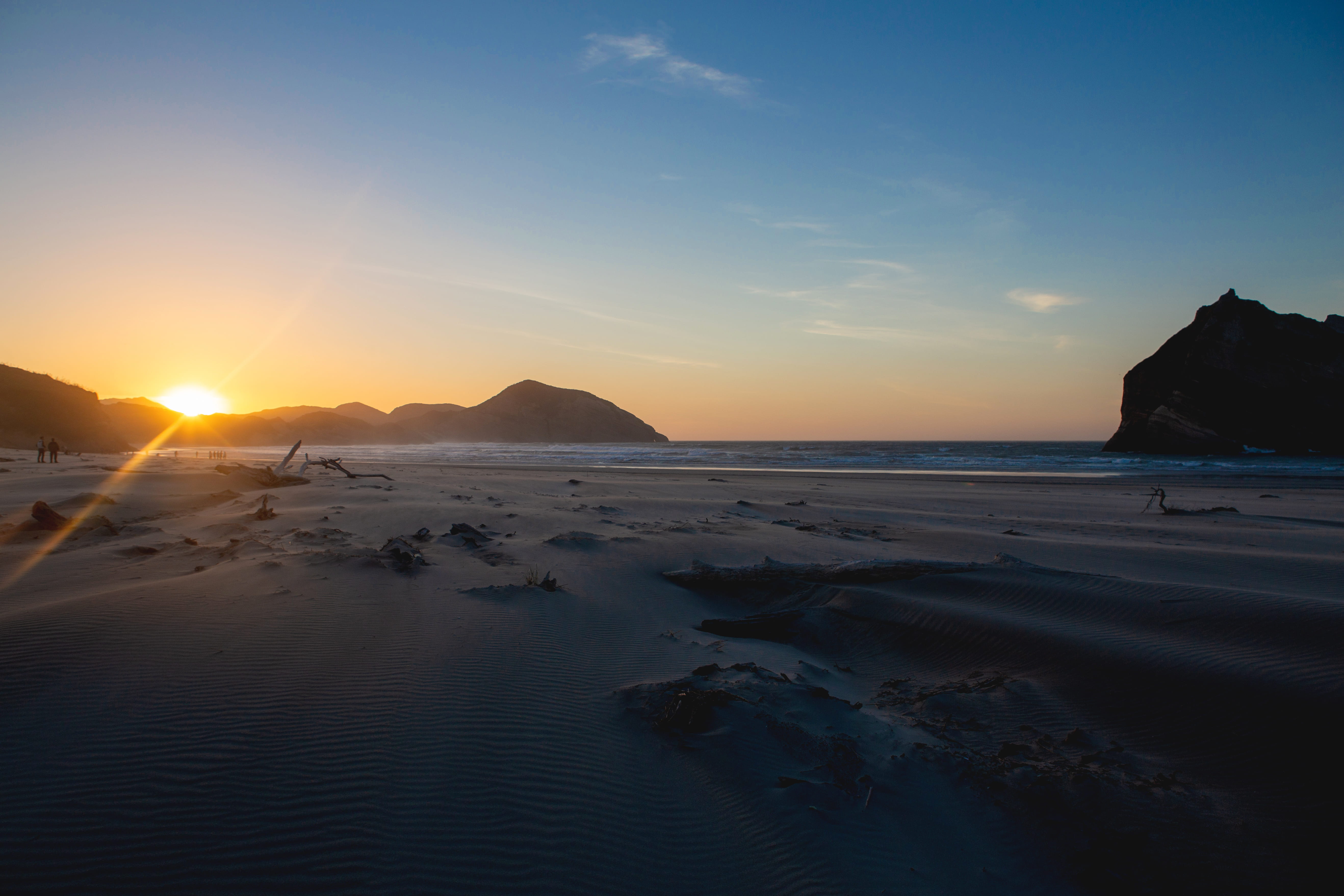 water, mountain, orange color, dawn, nature, dusk, sky, scenics - nature, sand, beach, person, silhouette, dune, non-urban scene, human, flare, sunset, HD Wallpaper