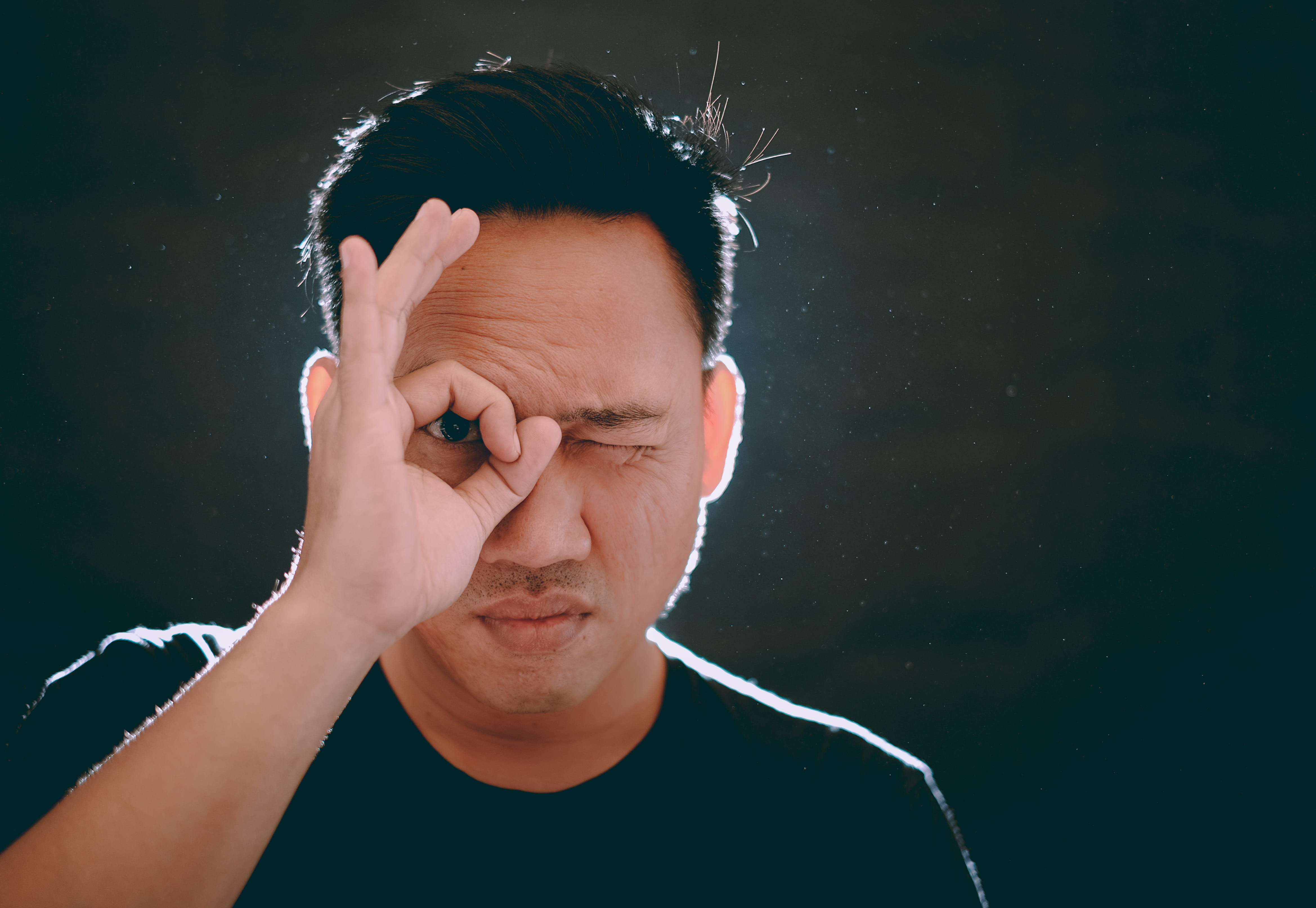 one person, black background, indonesia, man, emotion, photo shoot, indoors, front view, young adult, studio shot, asian, bandung, potrait, close-up, finger, HD Wallpaper