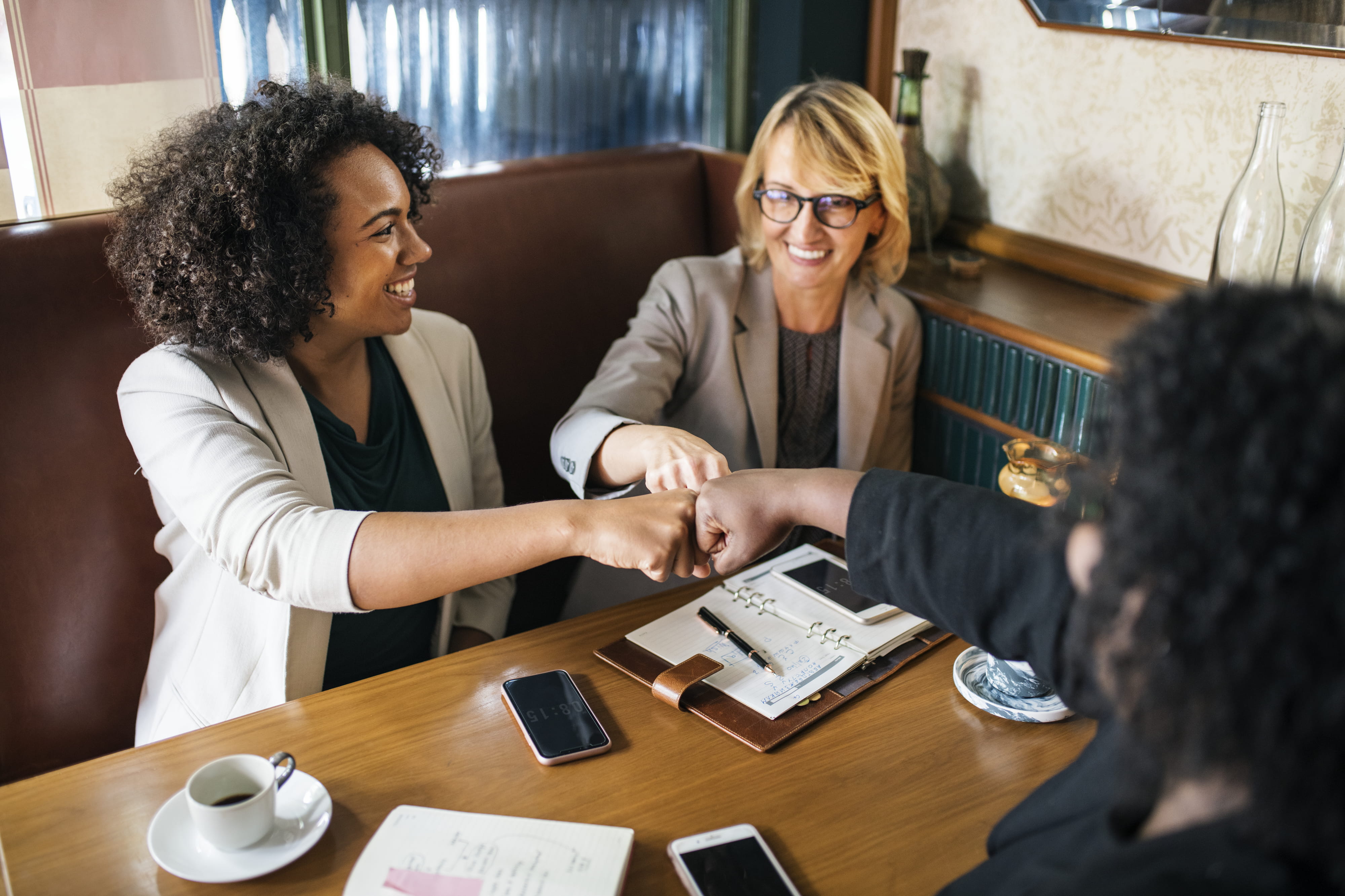 desk, three, fistbump, woman, teamwork, sitting, coworker, together, coffee shop, colleagues, two people, adult, coffee, technology, women, padded, westerner, HD Wallpaper