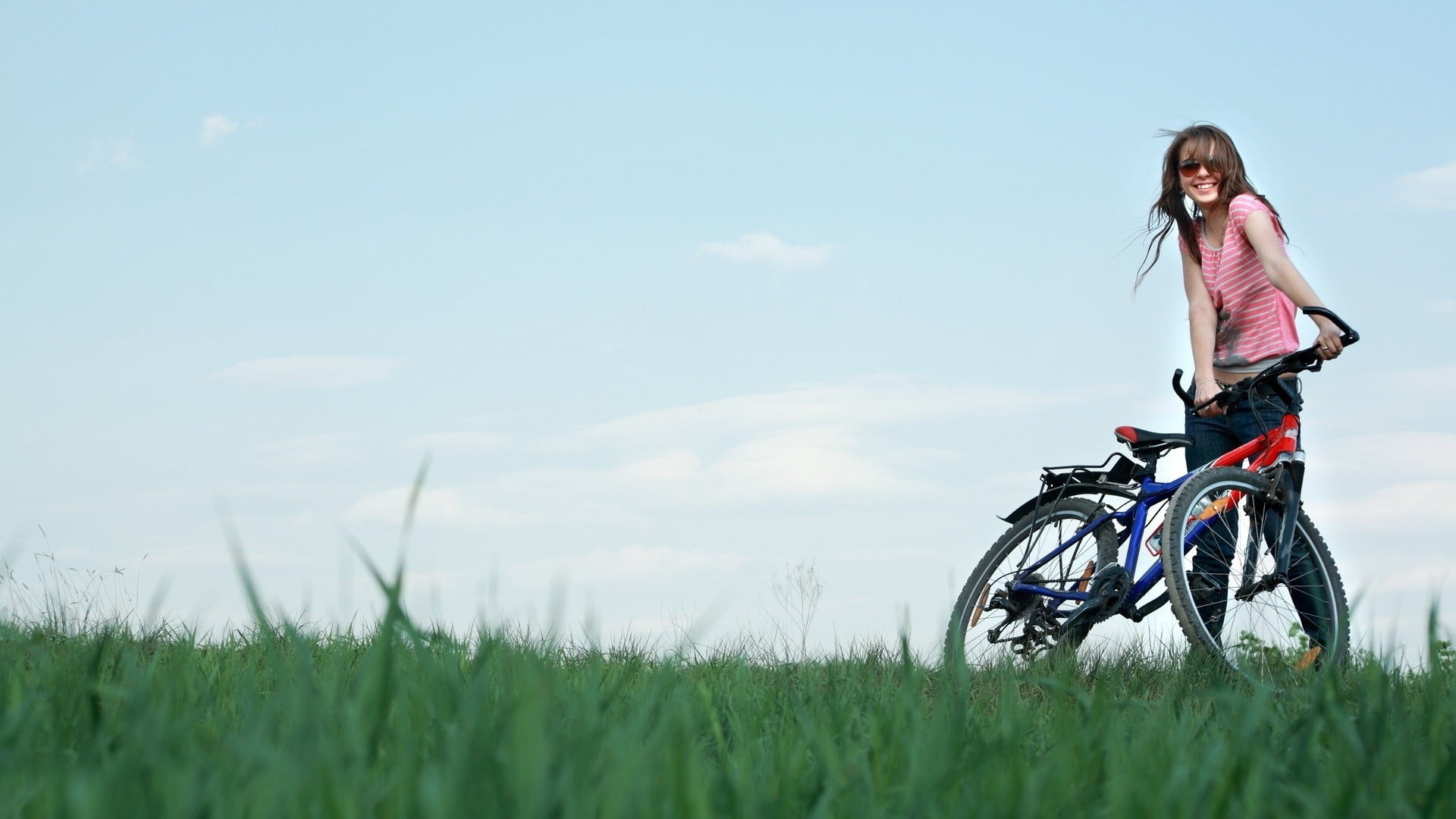 1080P, outdoors, real people, casual clothing, young adult, transportation, bicycle, sky, day, land, jeans, plant, one person, women, pink tops, field, HD Wallpaper