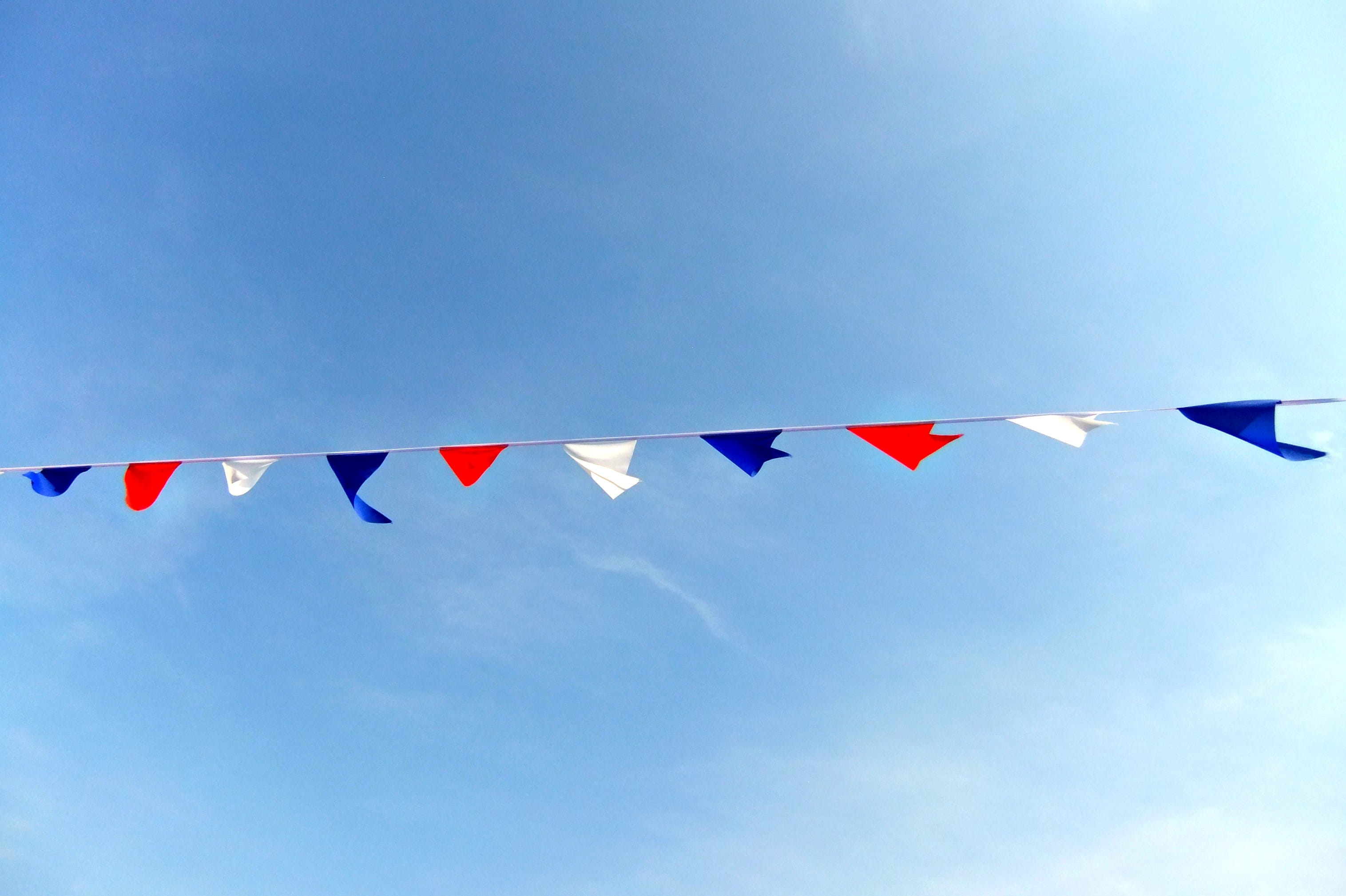 string, sunshine, wind, bunting, celebration, low angle view, shape, triangle shape, day, white, colours, no people, multi colored, nature, red, cloud - sky, HD Wallpaper