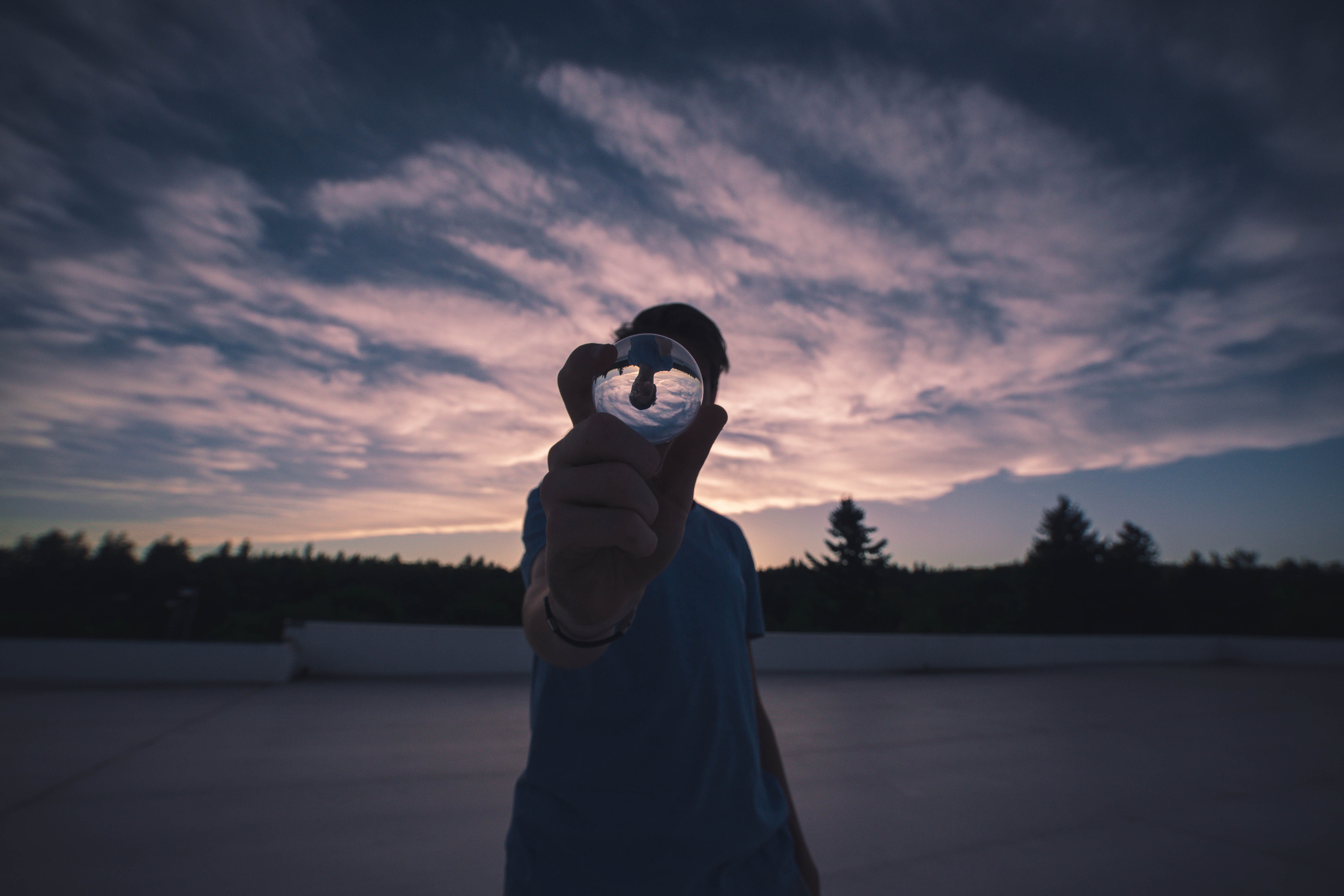 holding, hedge, waist up, adult, silhouette, teenager, child, tree, lensball, pose, tranquil scene, leisure activity, ball, man on roof, cloud - sky, concrete, HD Wallpaper