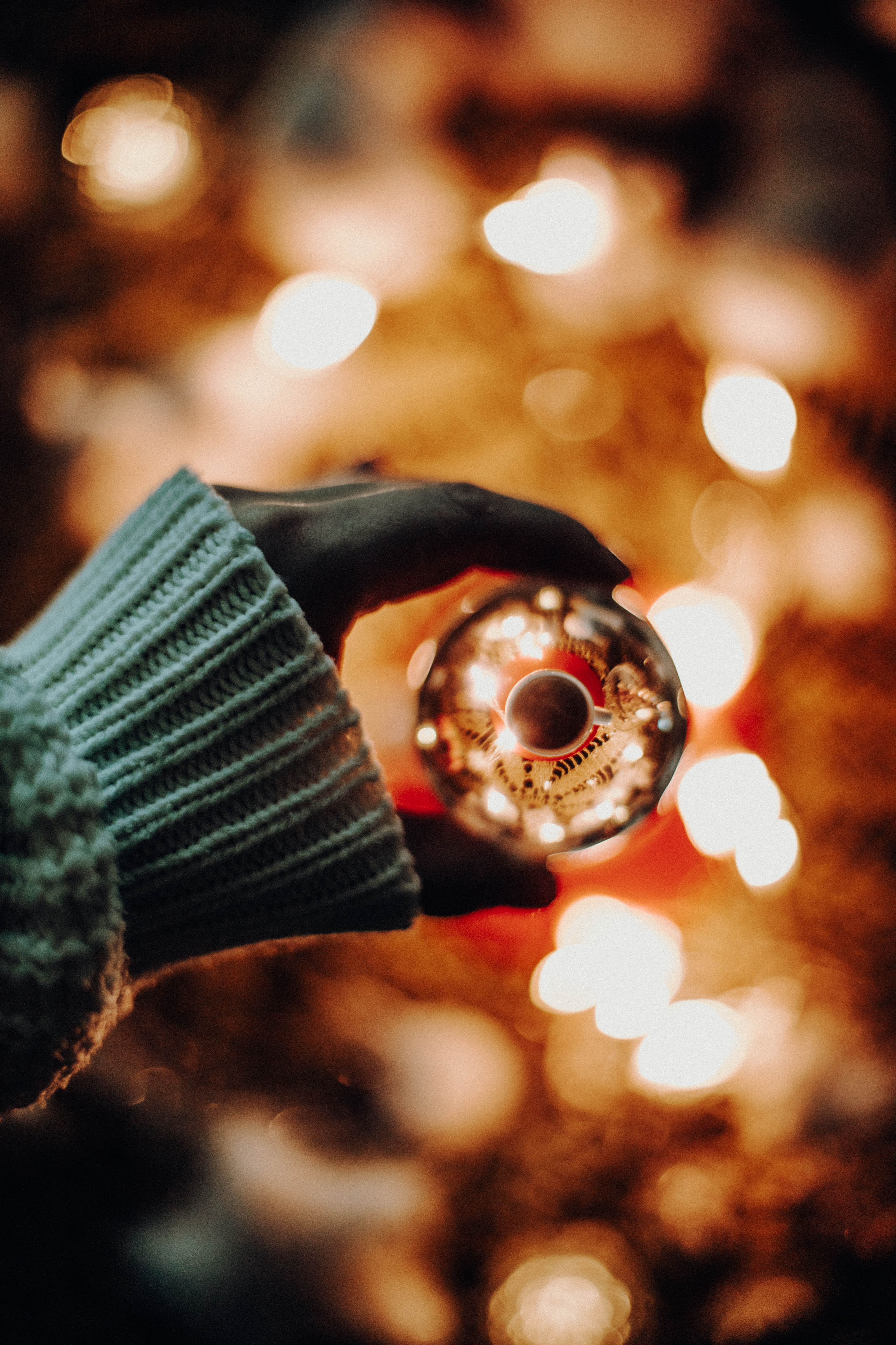 Lensball, defocused, hand, illuminated, person, nature, bright, celebration, bauble, glisten, focus, christmas, focus on foreground, shape, tree, christmas ornament, Phone HD Wallpaper