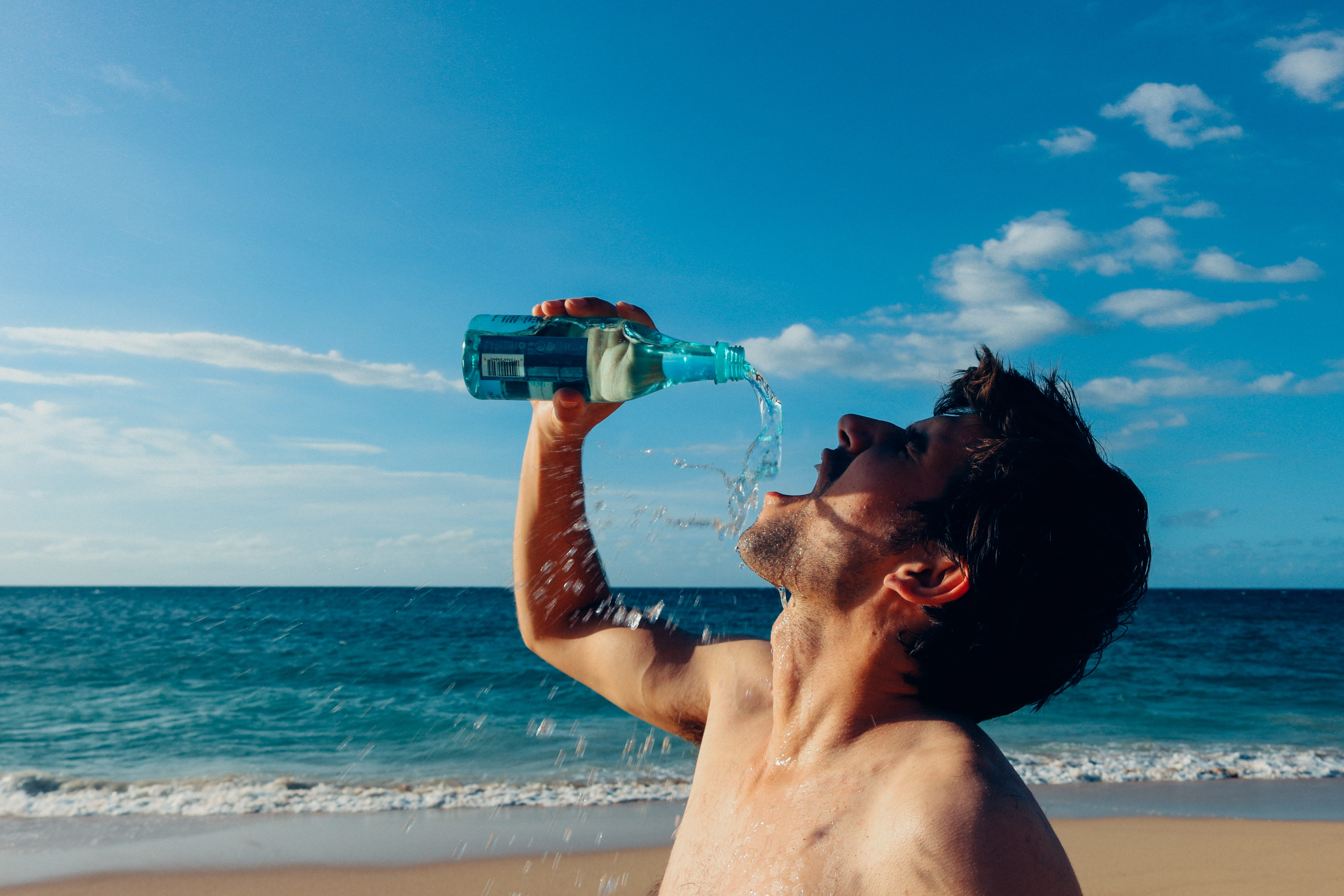 real people, drink water, lifestyles, leisure activity, drinking, man, young adult, time, blue, sky, sea, land, splash, photography, young men, hawaii, HD Wallpaper