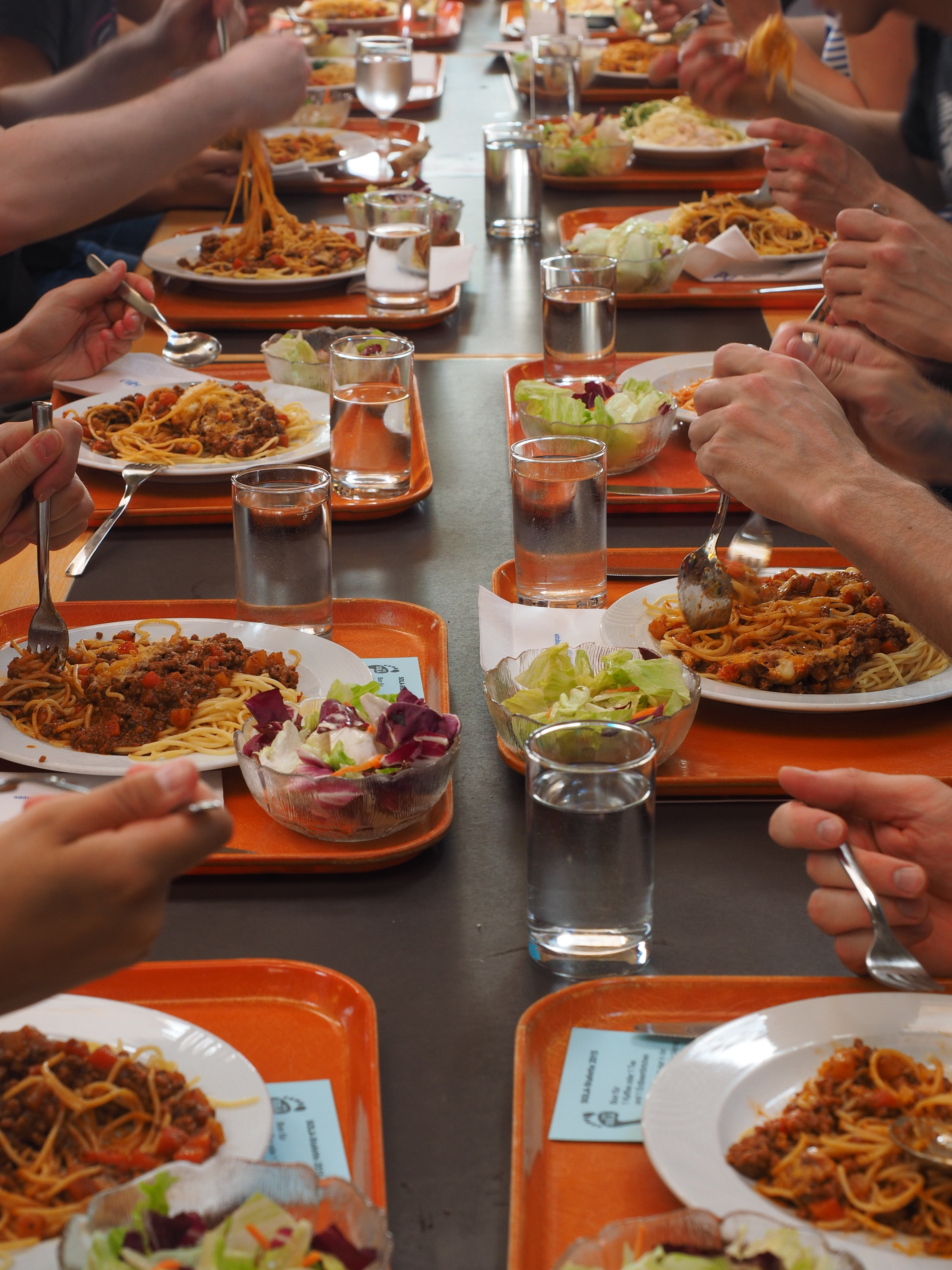 holding, food, pizza, meal, court, canteen, large kitchen, tuck in, dine, food and drink, table, industrial kitchen, group of people, fill, spaghetti, leisure activity, Phone HD Wallpaper