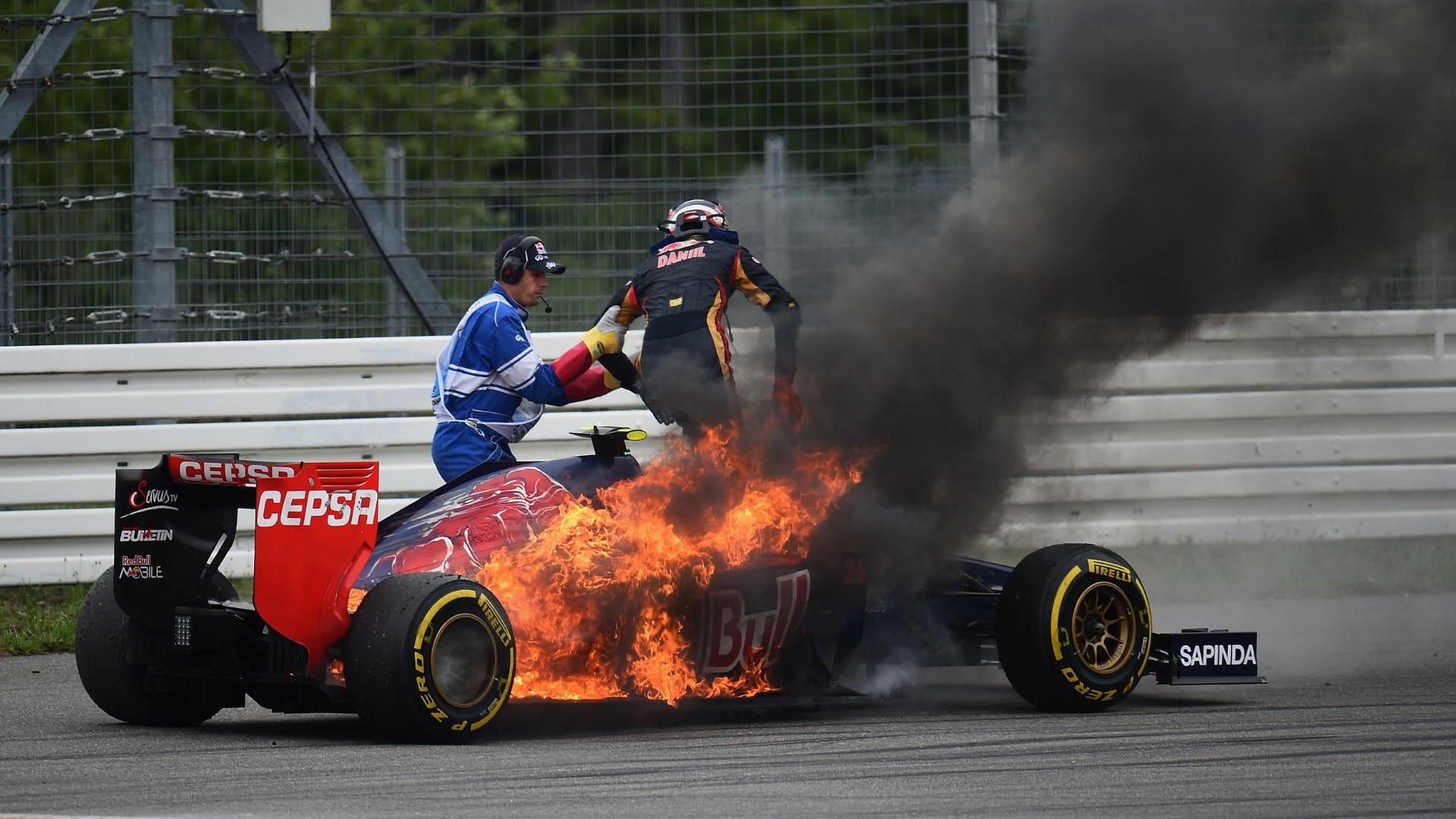 toro rosso on fire, security, people, men, sport, sports helmet, group of people, adult, mode of transportation, wheel, crash helmet, 1080P, helmet, fire hose, HD Wallpaper