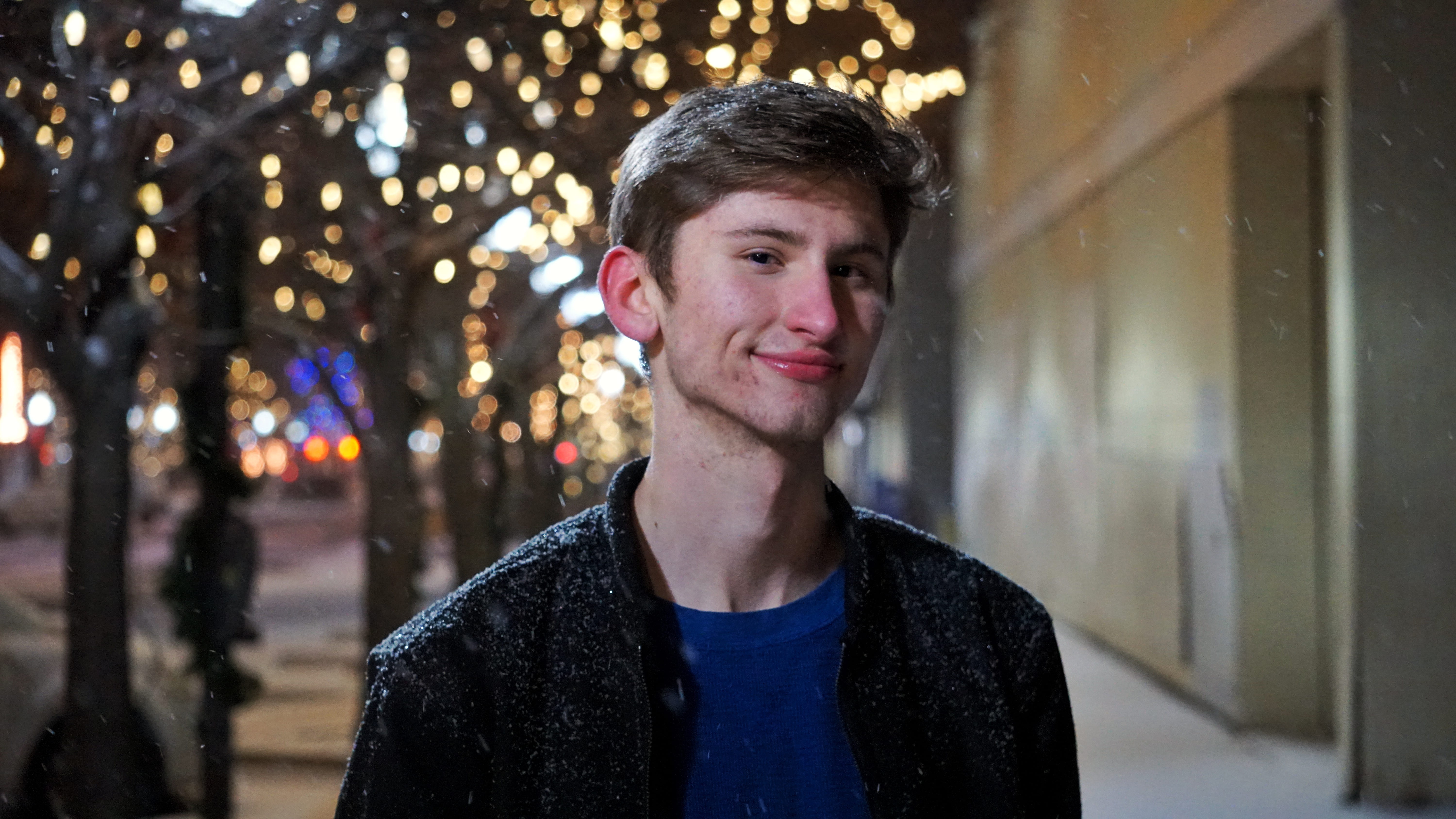 night, leisure activity, lawrence, city, downtown, focus on foreground, snow, smile, holiday, one person, young adult, warm clothing, casual clothing, front view, HD Wallpaper