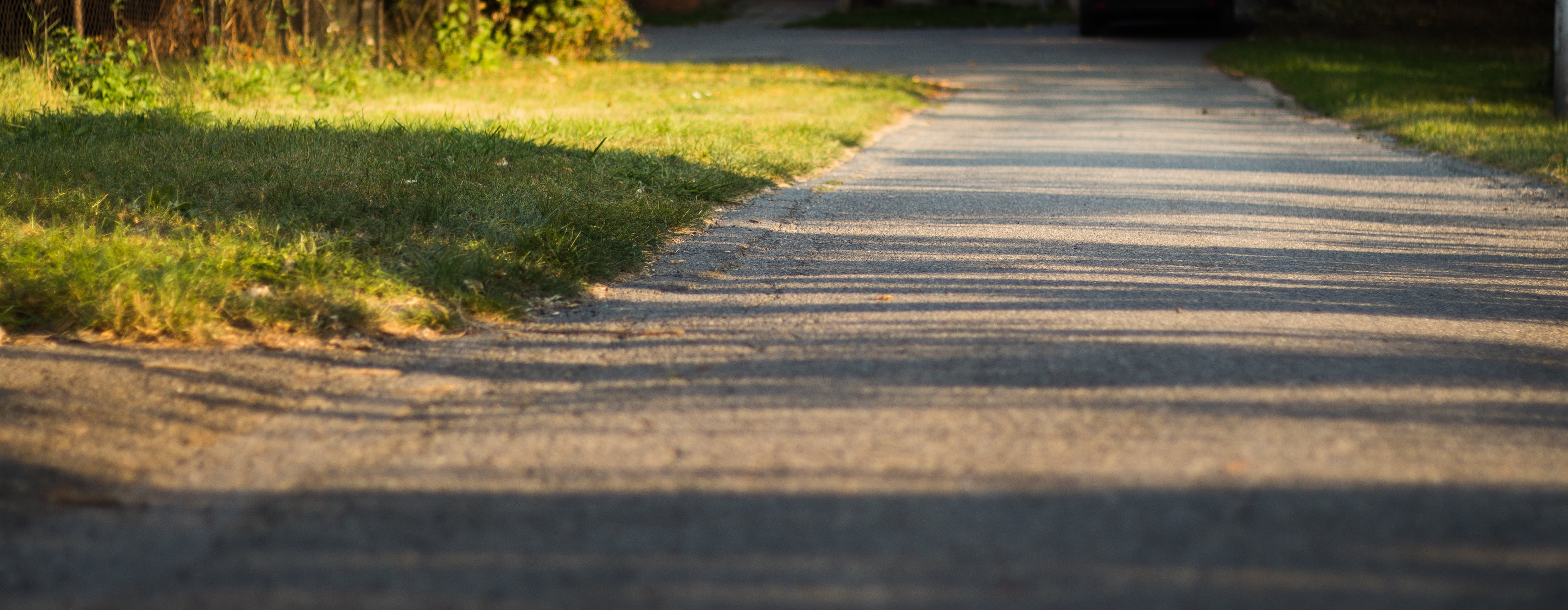 concrete, footpath, green color, sunlight, field, diminishing perspective, hobby, plant, city, walking, action, green, direction, distance, focus on shadow, HD Wallpaper