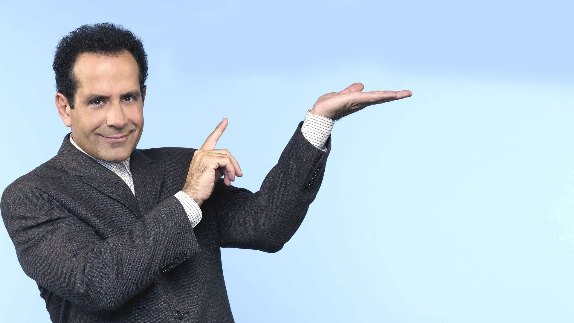 one person, finger, looking at camera, human arm, happiness, smiling, Tony Shalhoub, clothing, human hand, adult, waist up, front view, standing, blue, HD Wallpaper