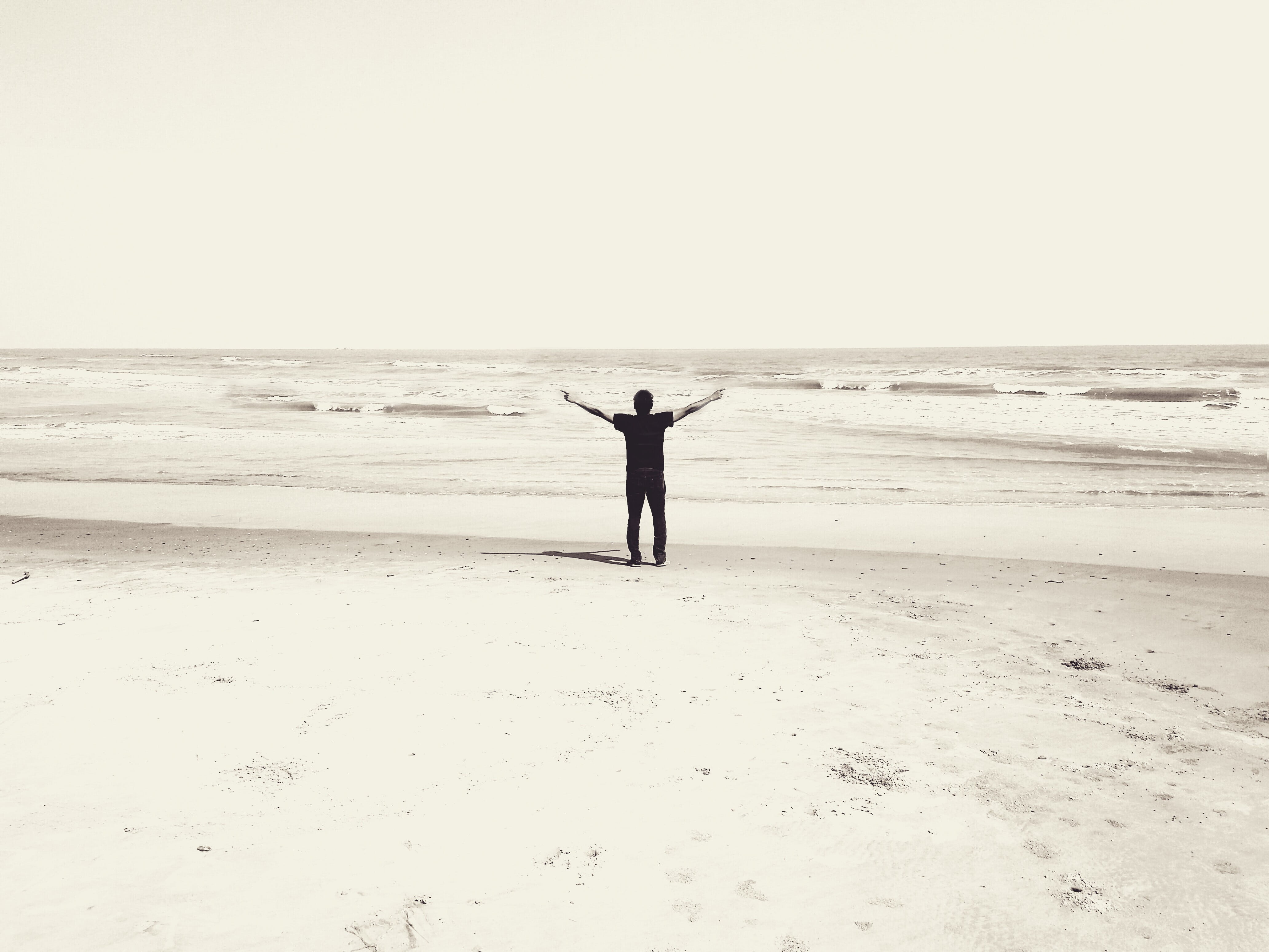 tranquil scene, horizon, human arm, people, horizon over water, male, beach, standing, scenics - nature, leisure activity, seashore, land, sepia, worship, HD Wallpaper