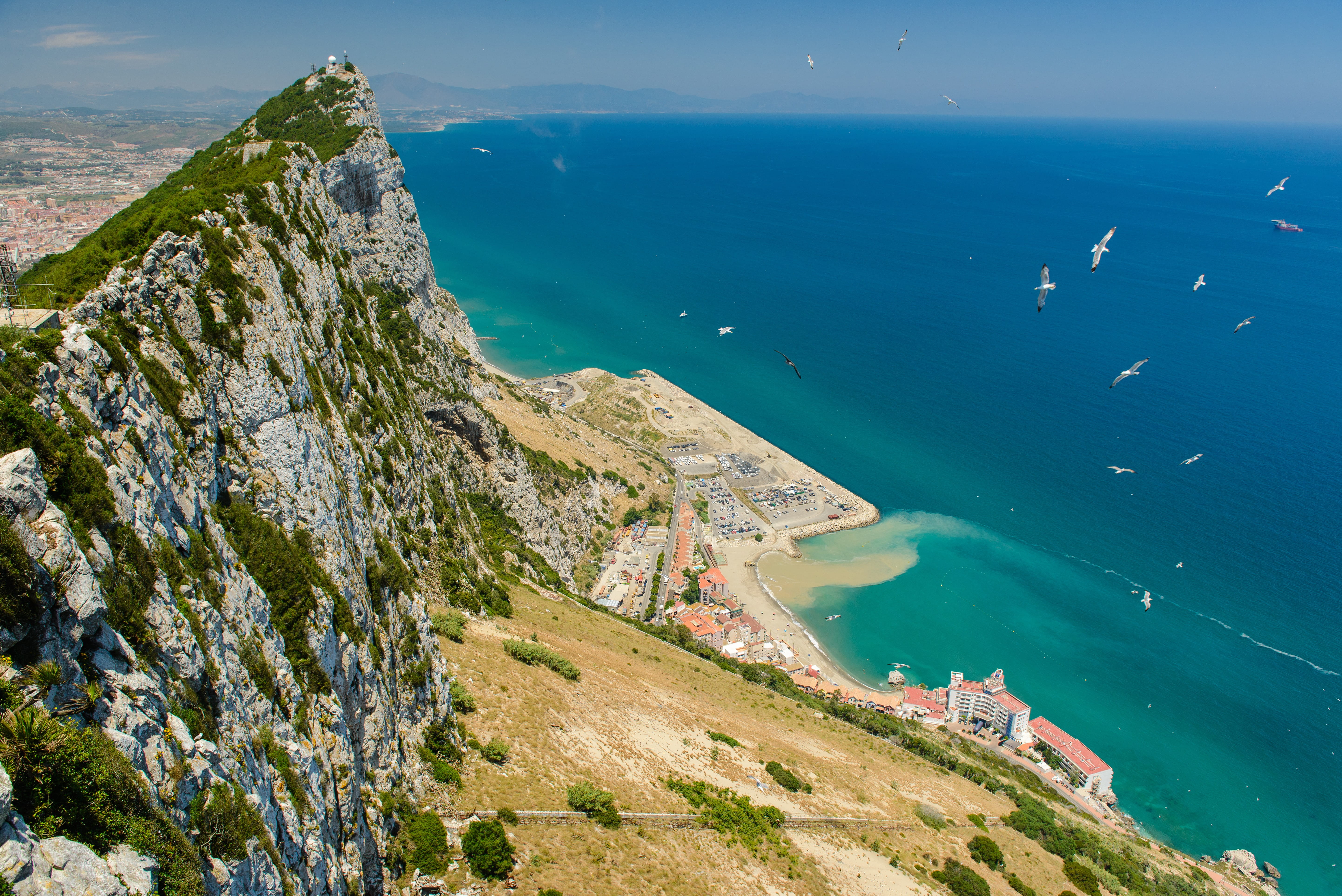 seashore, tranquil scene, bird, blue, scenics - nature, high angle view, beside, seagull, nature, 5K, day, mountain, idyllic, gibraltar, built structure, HD Wallpaper