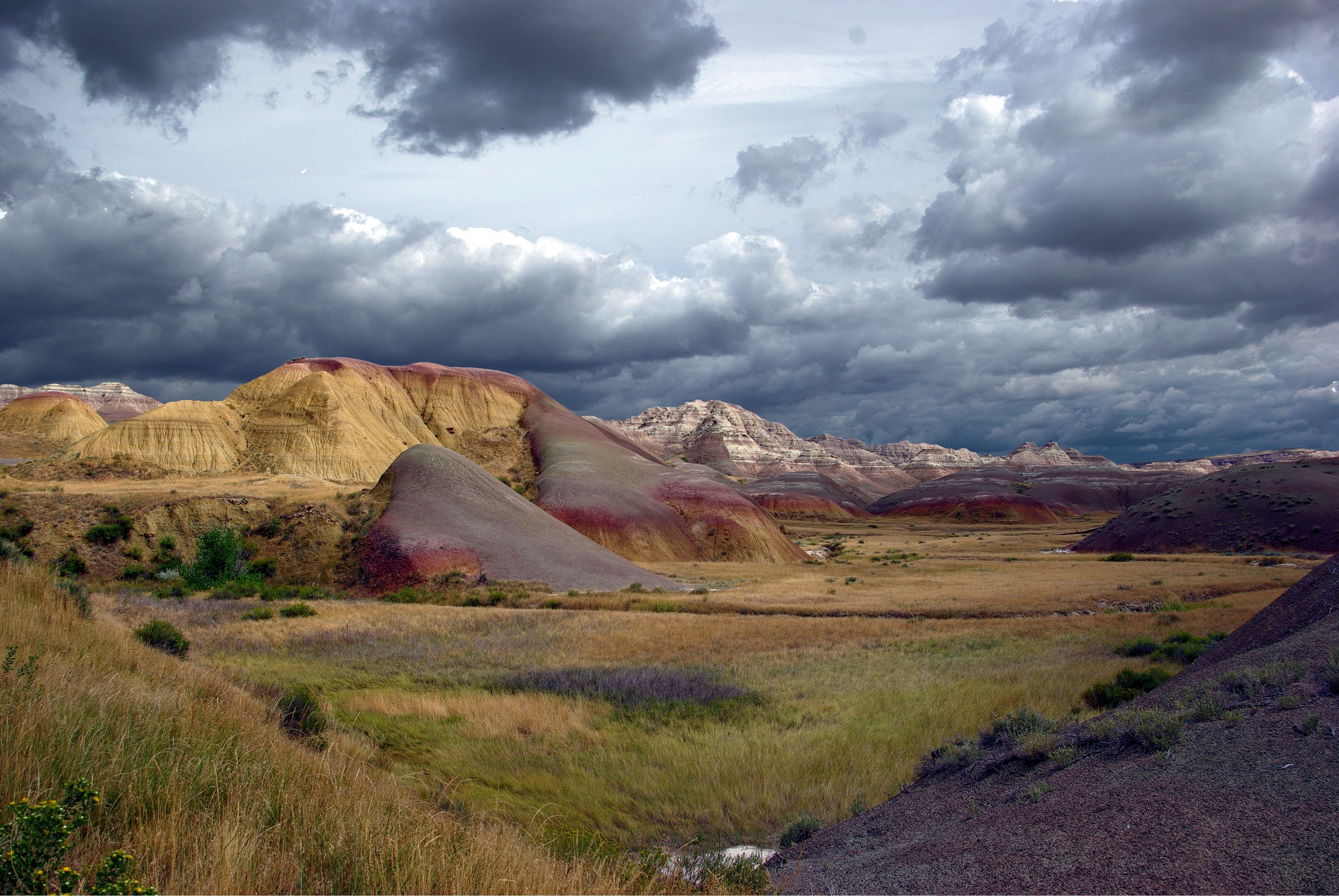 tranquility, formations, clouds, usa, storm, land, south, overcast, rock, no people, park, dakota, colorful, formation, geological, travel destinations, HD Wallpaper