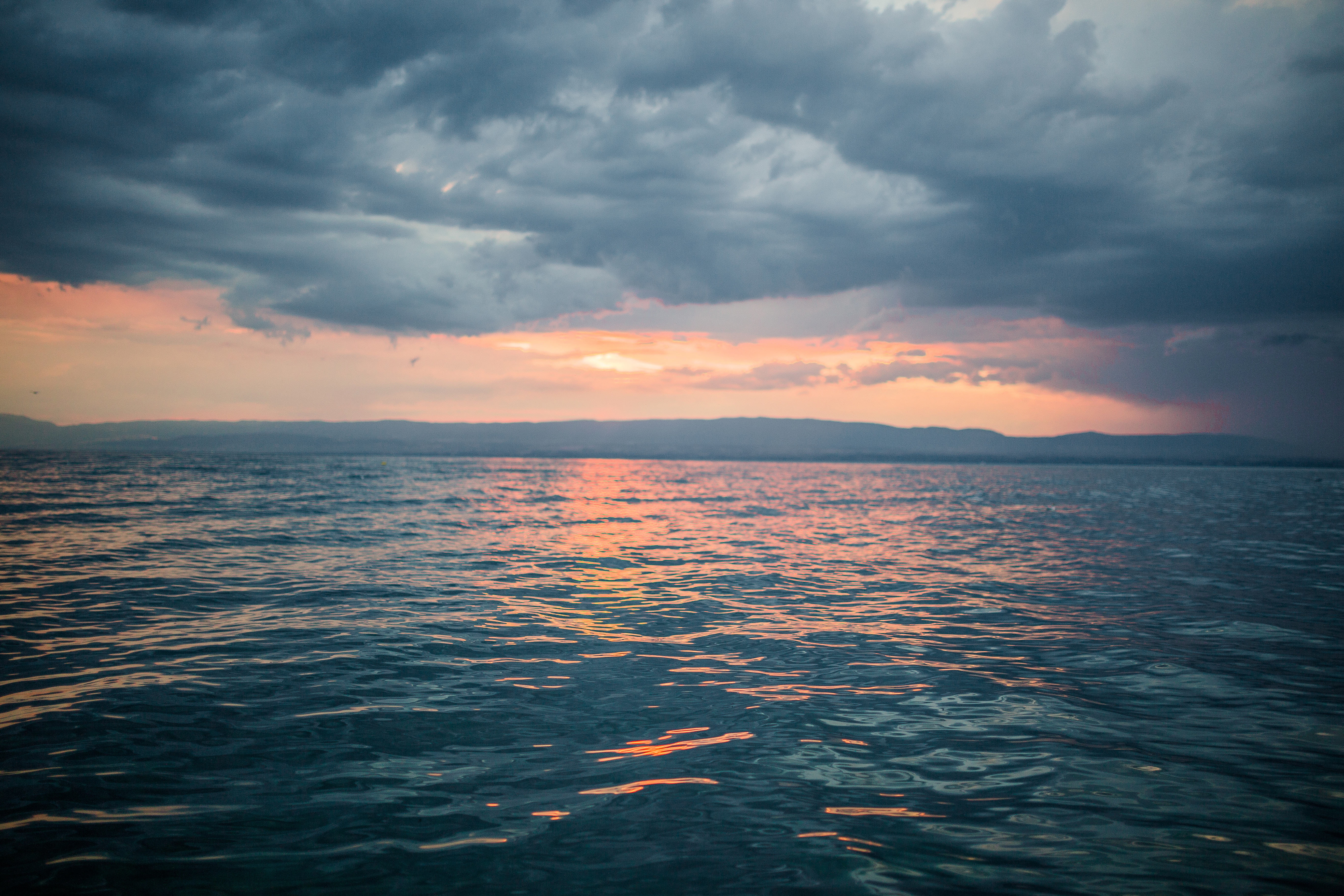hour, body, ocean, photography, water, storm, nature, orange color, beauty in nature, waterfront, grey, dusk, cloudy, clouds, tranquil scene, ominous, white, HD Wallpaper