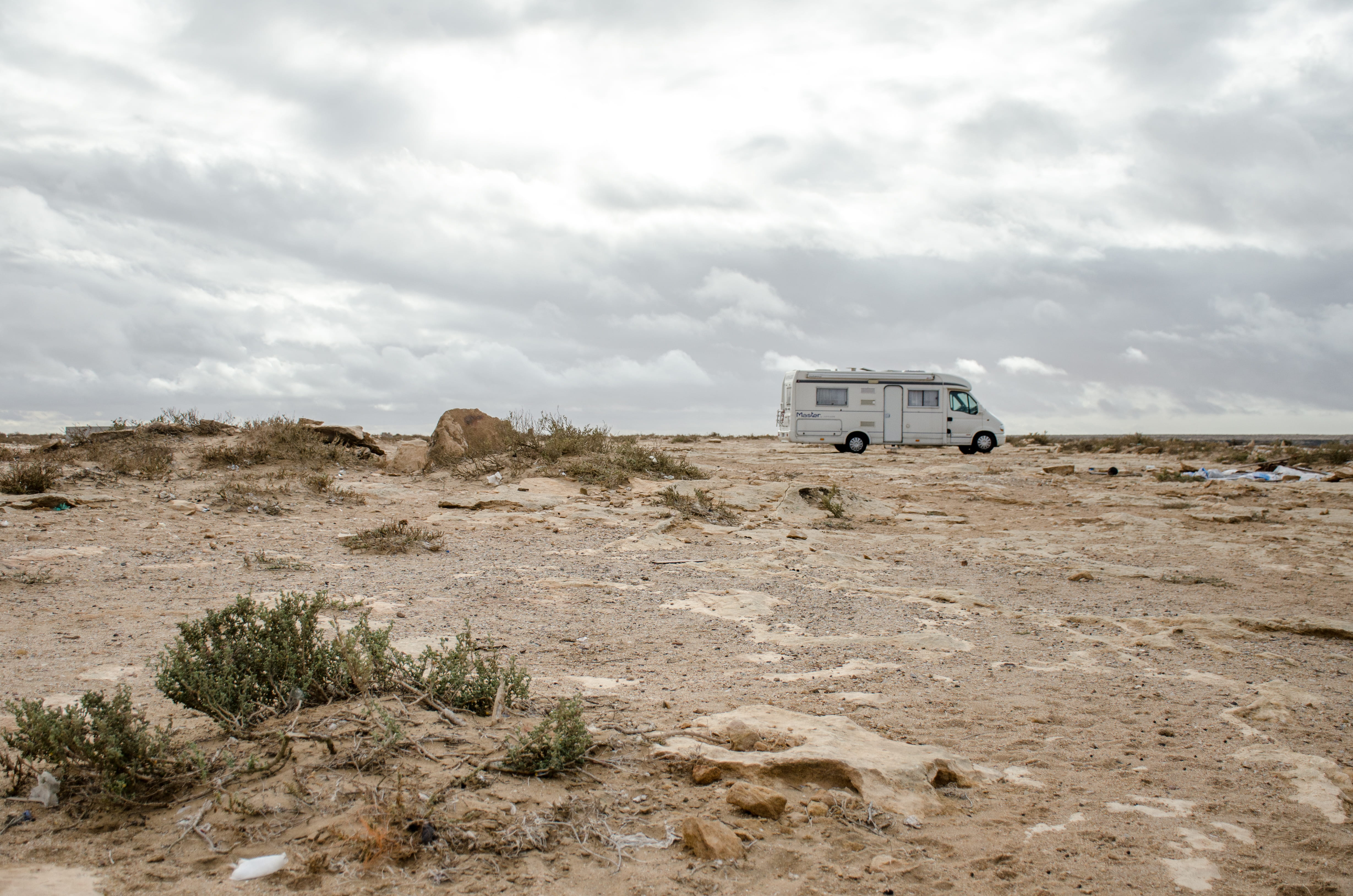 b, motorhorm, bus, off-road vehicle, mud, western sahara, cloud - sky, offroad, caravan, rv, van, landscape, animal, no people, land, environment, soil, HD Wallpaper