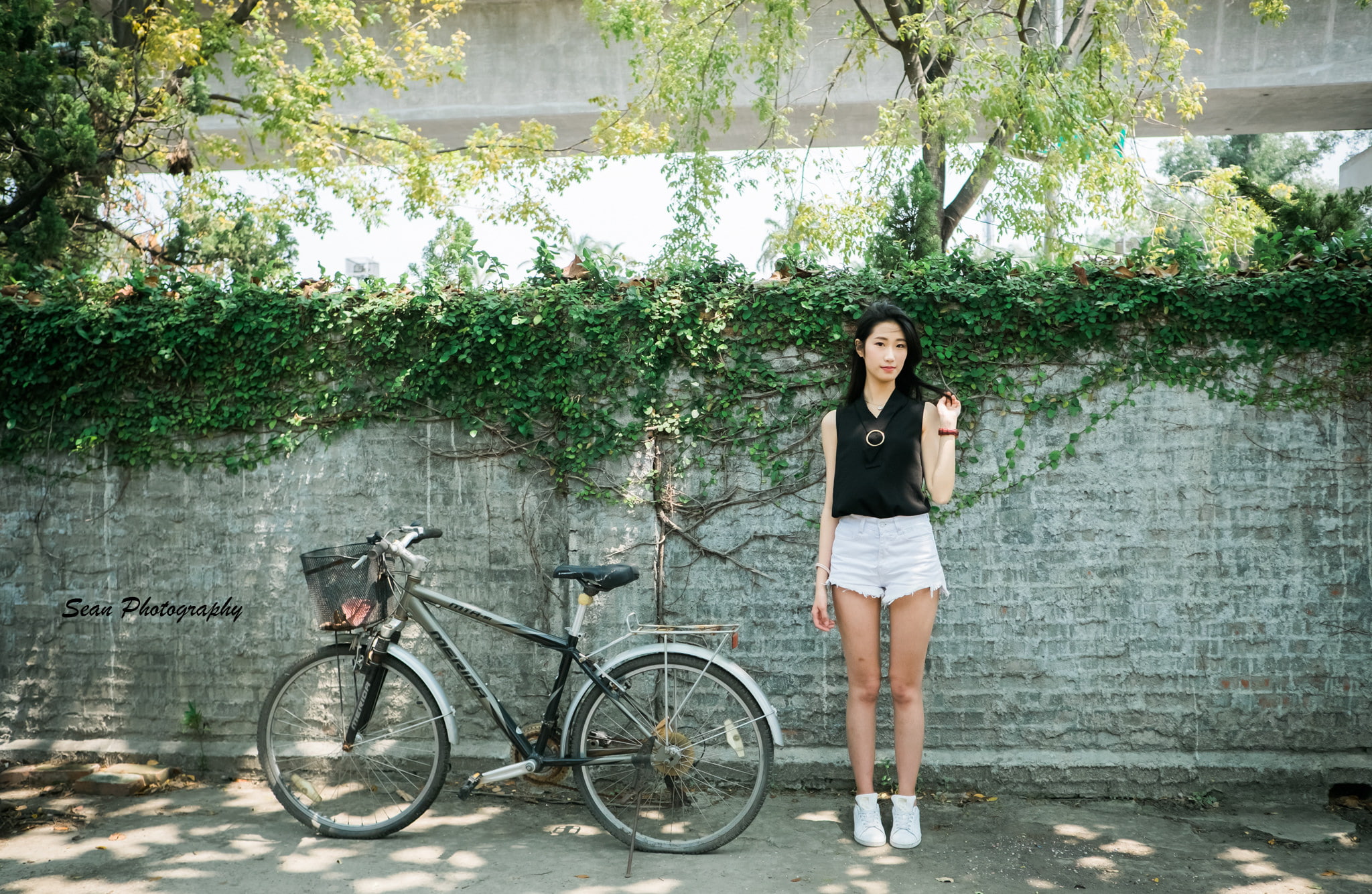 jean shorts, outdoors, portrait, lifestyles, one person, tree, black hair, day, full length, Asian, standing, plants, wall, mode of transportation, plant, HD Wallpaper
