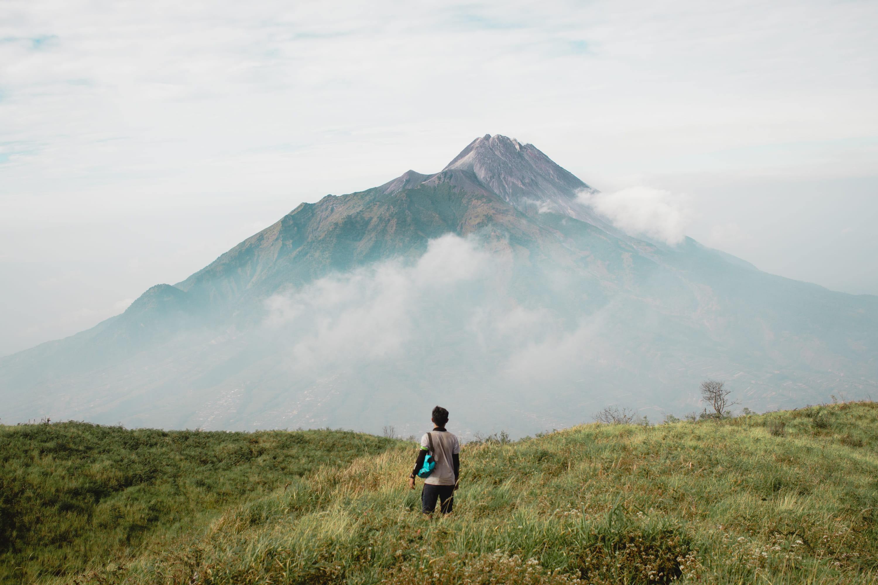 outdoors, indonesia, real people, sky, one person, landscape, grass, lifestyles, nature, leisure activity, fog, mountain range, idyllic, land, people, 2K, HD Wallpaper