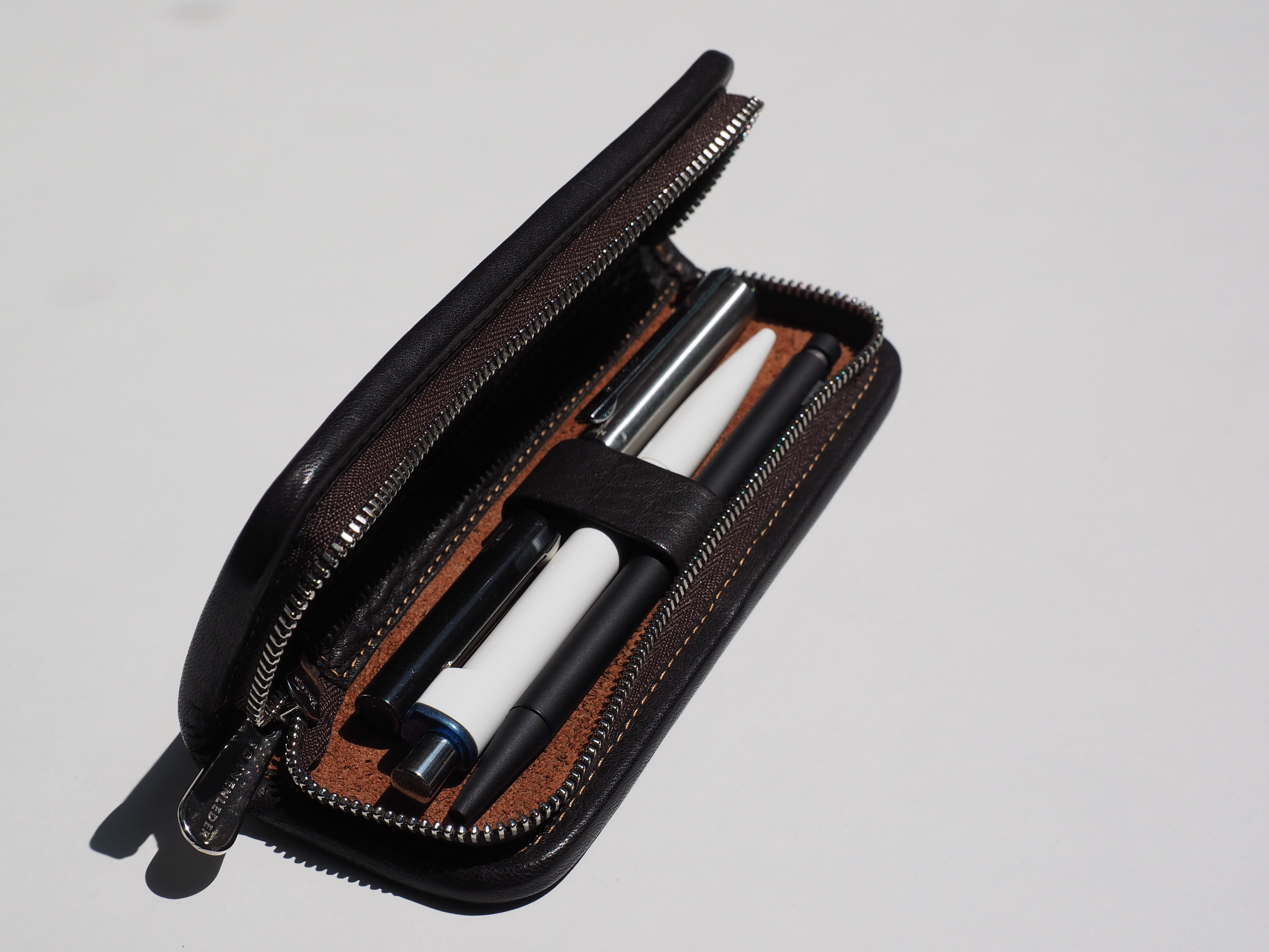 still life, case, leather writing-case, aggression, Pens, no people, Cases, handgun, pencil cases, metal, zip, two objects, 4K, high angle view, work tool, HD Wallpaper