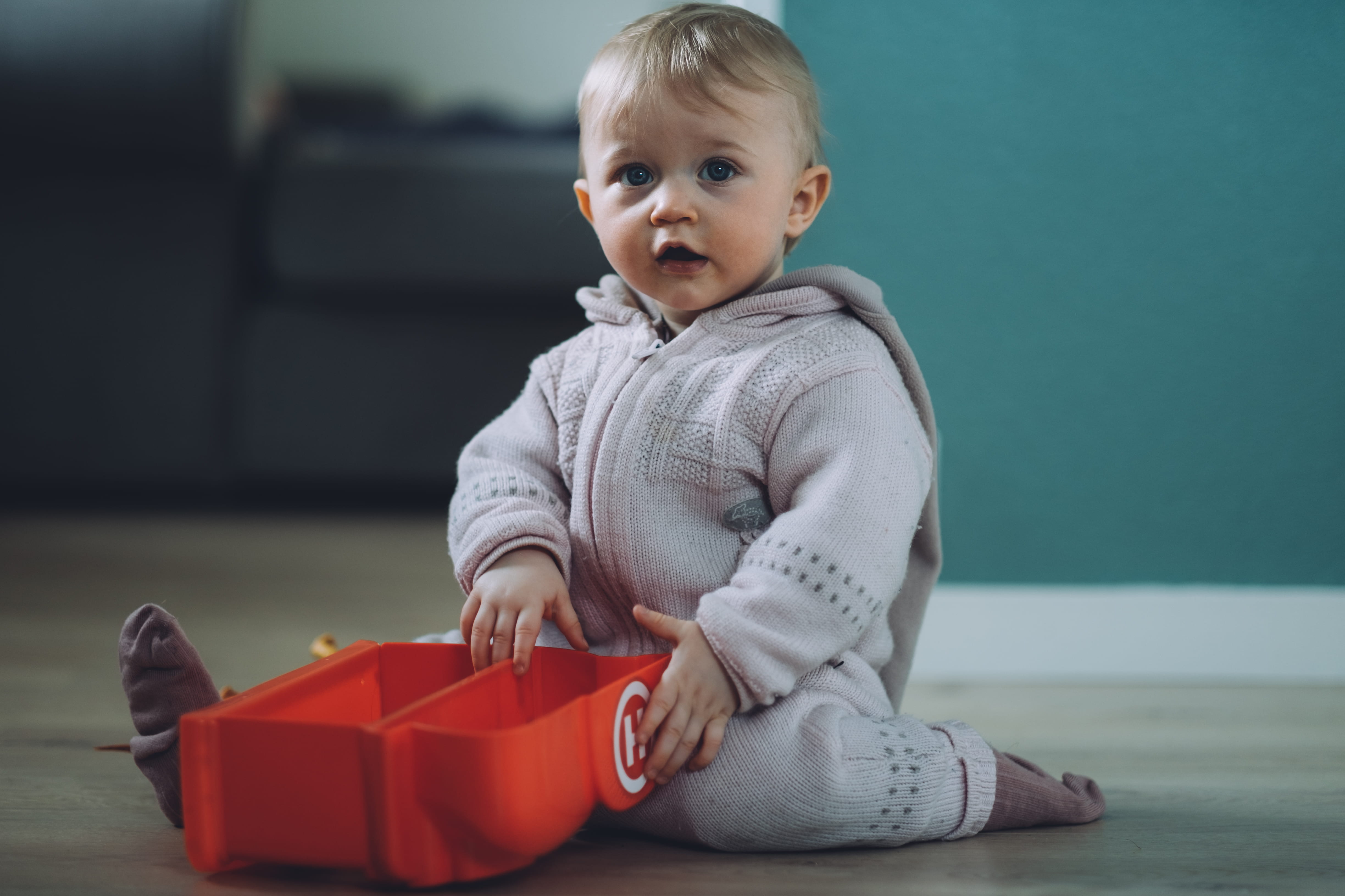 wearing, emotion, children, innocence, full length, red, toy, gift, sitting, baby, childhood, clothing, indoors, ground, case, focus on foreground, kid, HD Wallpaper