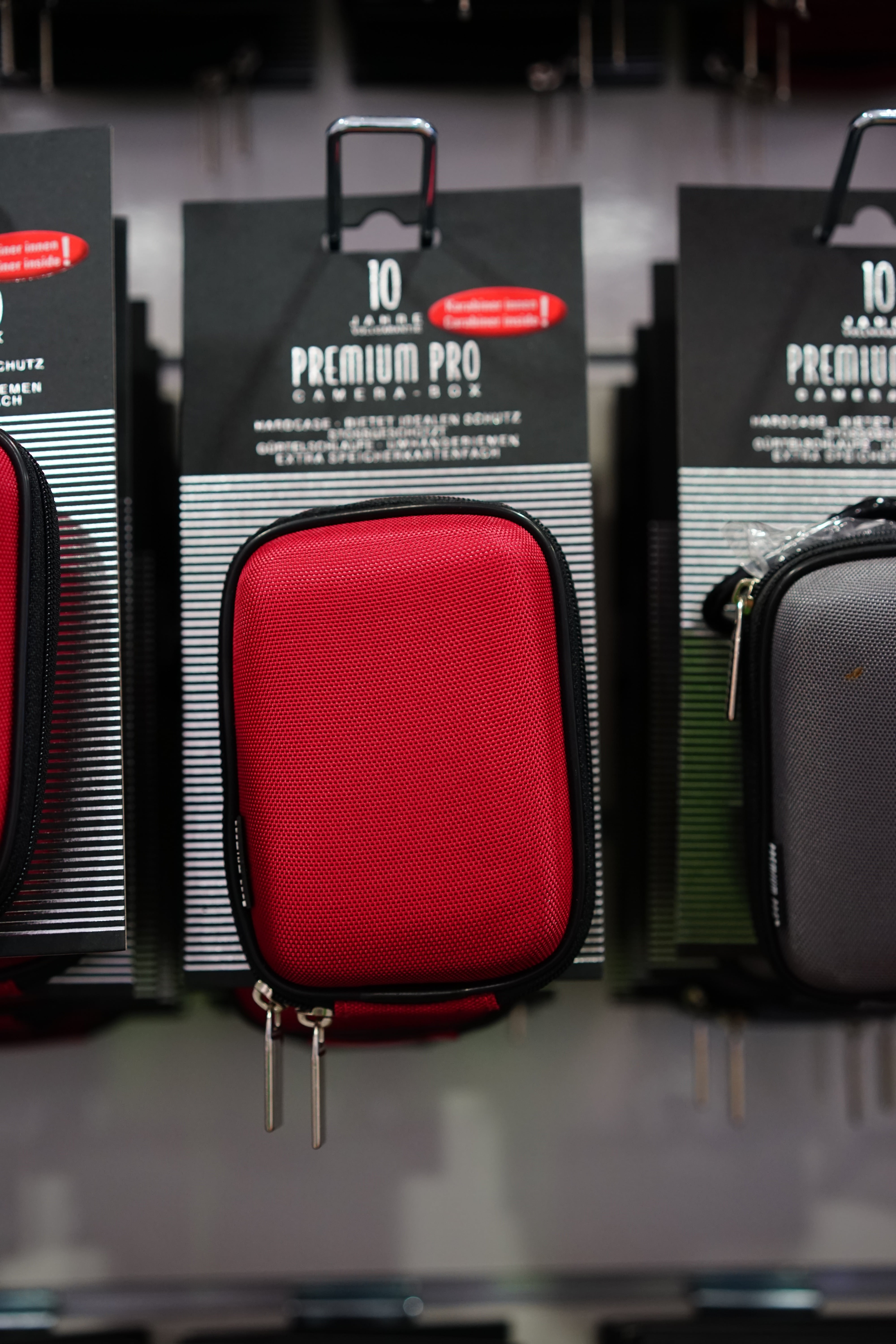 no people, fotoetui, control, photo bag, communication, red, 5K, selective focus, security, case, camera pouch, bag, protection, full frame, text, indoors, Phone HD Wallpaper