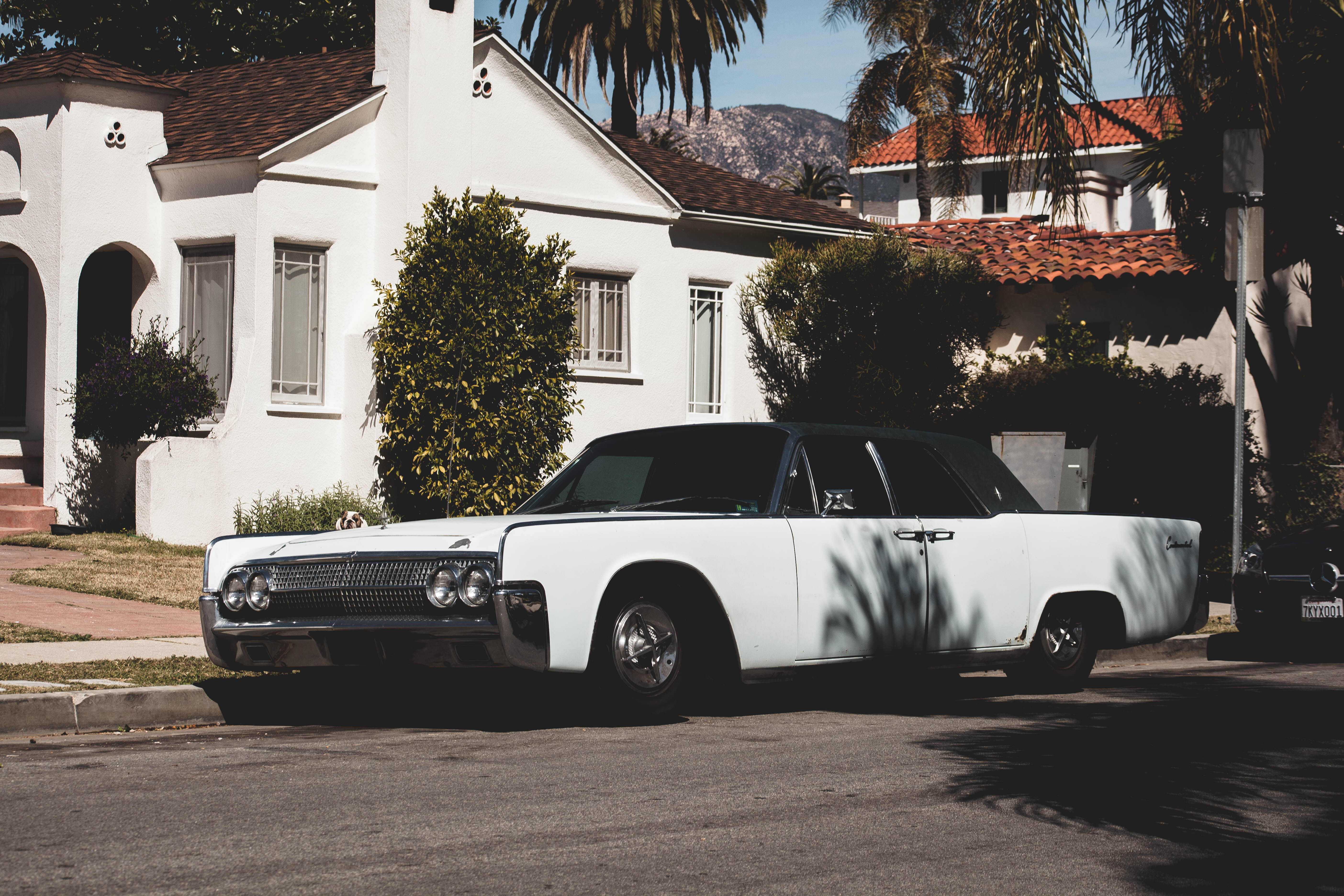 city, street, day, outdoors, old car, sunny, transportation, car, 5K, motor vehicle, stationary, vintage car, garage, mode of transportation, black, house, HD Wallpaper