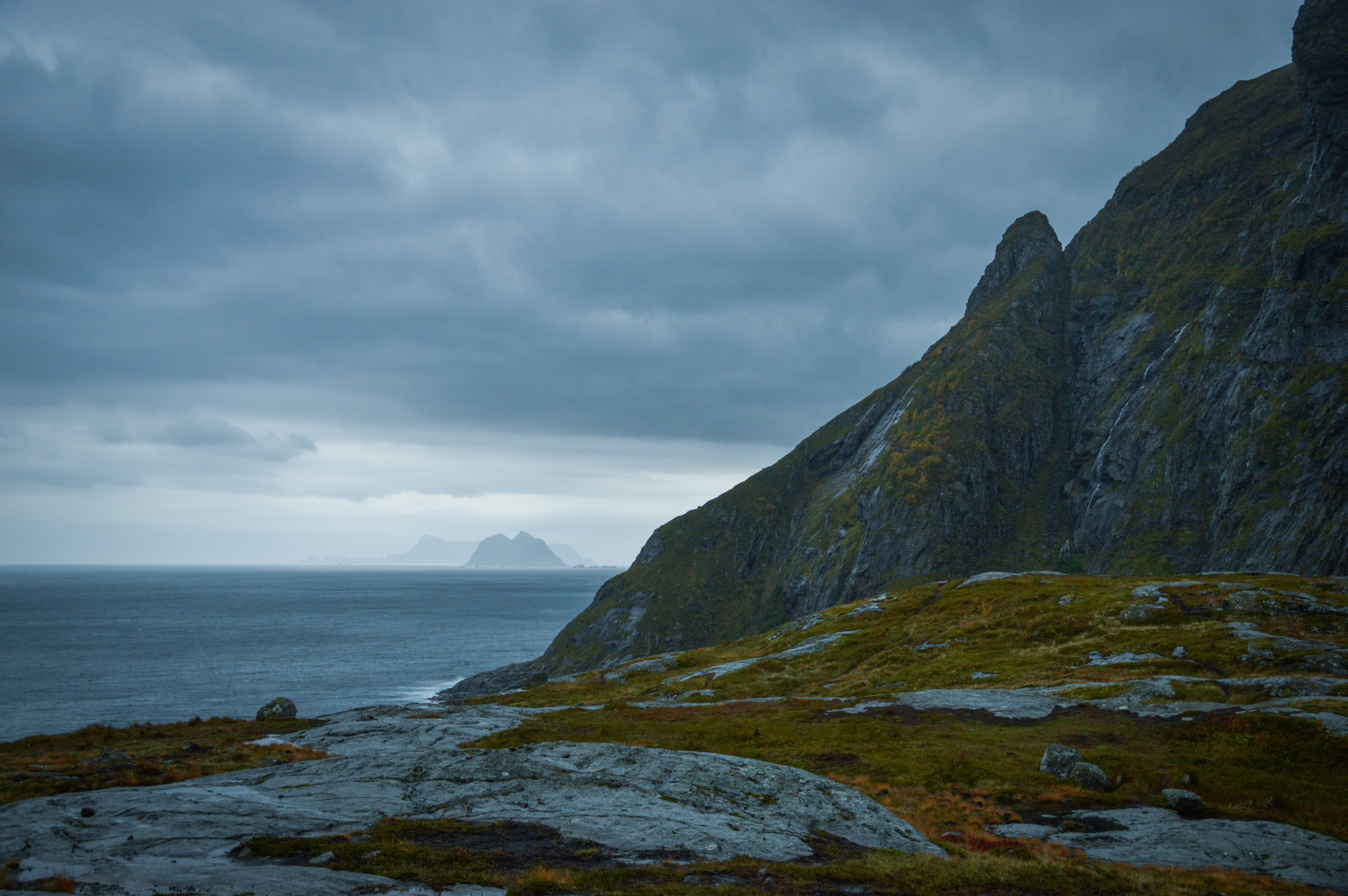 ocean, rock, cloud - sky, tranquil scene, no people, land, highland, grass, non-urban scene, rock - object, mountain peak, formation, water, geen, sea, HD Wallpaper