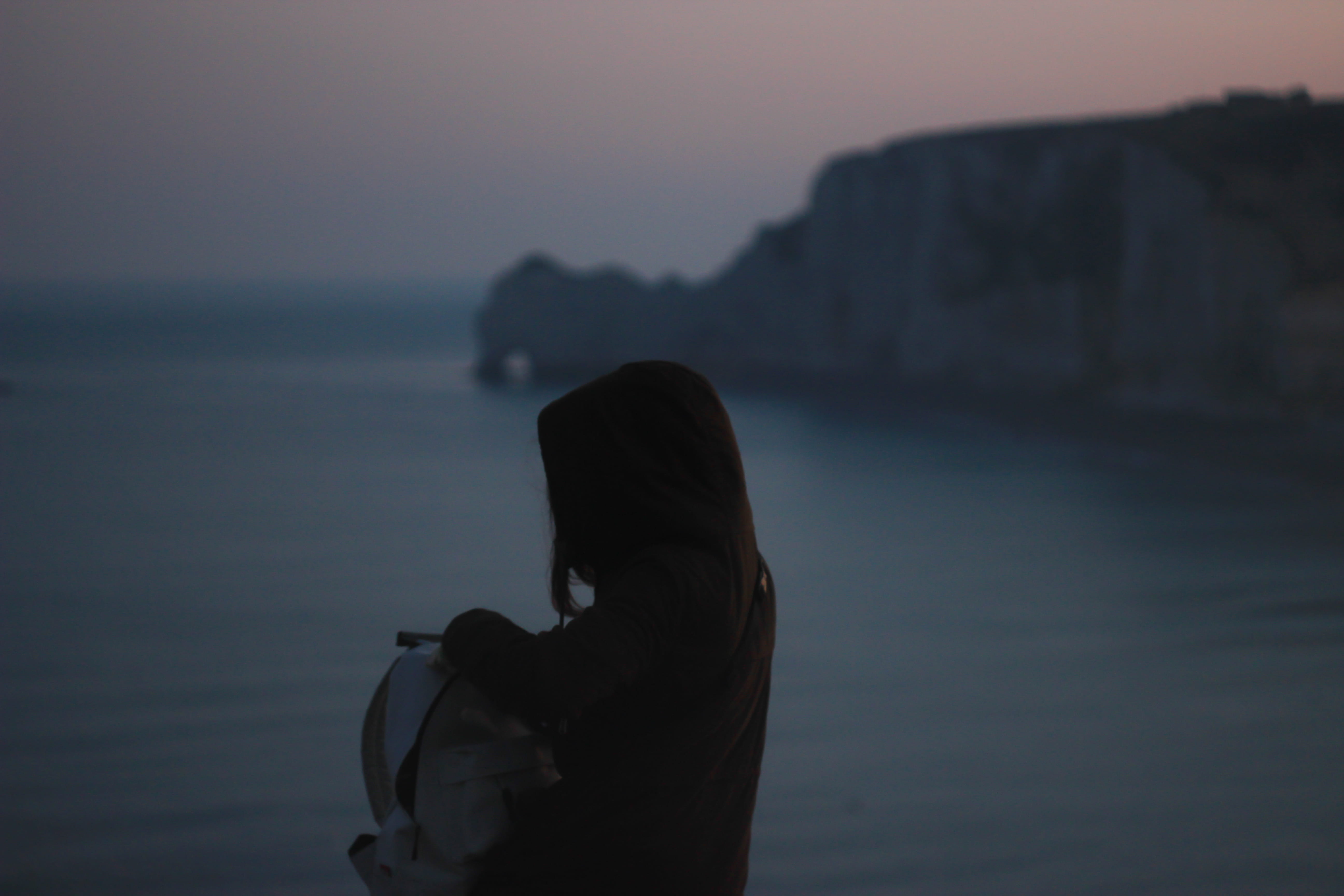 sea, hair, tranquil scene, ocean, backpack, france, one person, tranquility, sunset, real people, hood, lifestyles, bag, water, focus on foreground, nature, HD Wallpaper