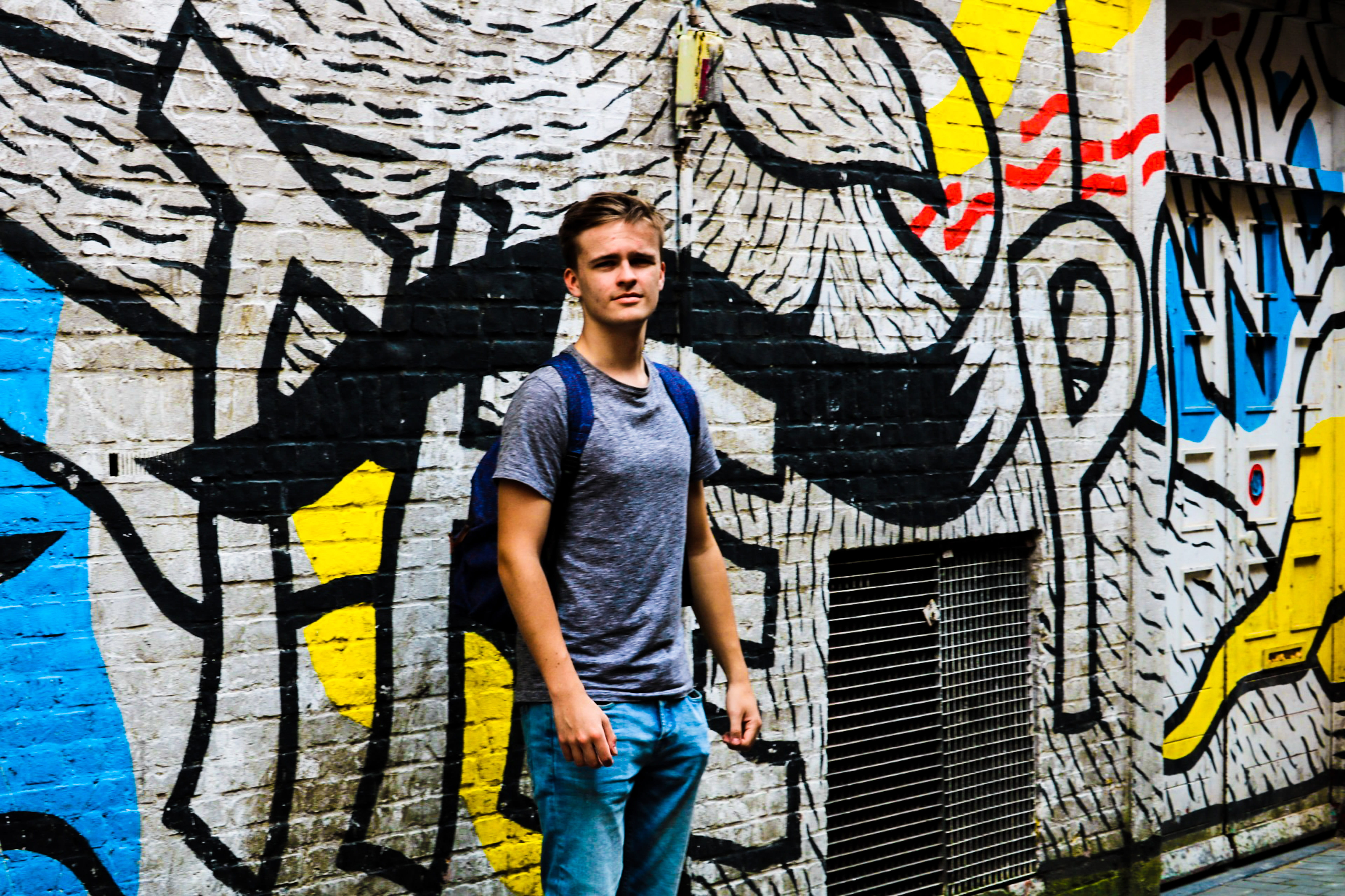creativity, back, netherlands, guy, young adult, front view, 750d, blue, black, young men, lifestyles, white, art and craft, outdoors, confused, backpack, HD Wallpaper