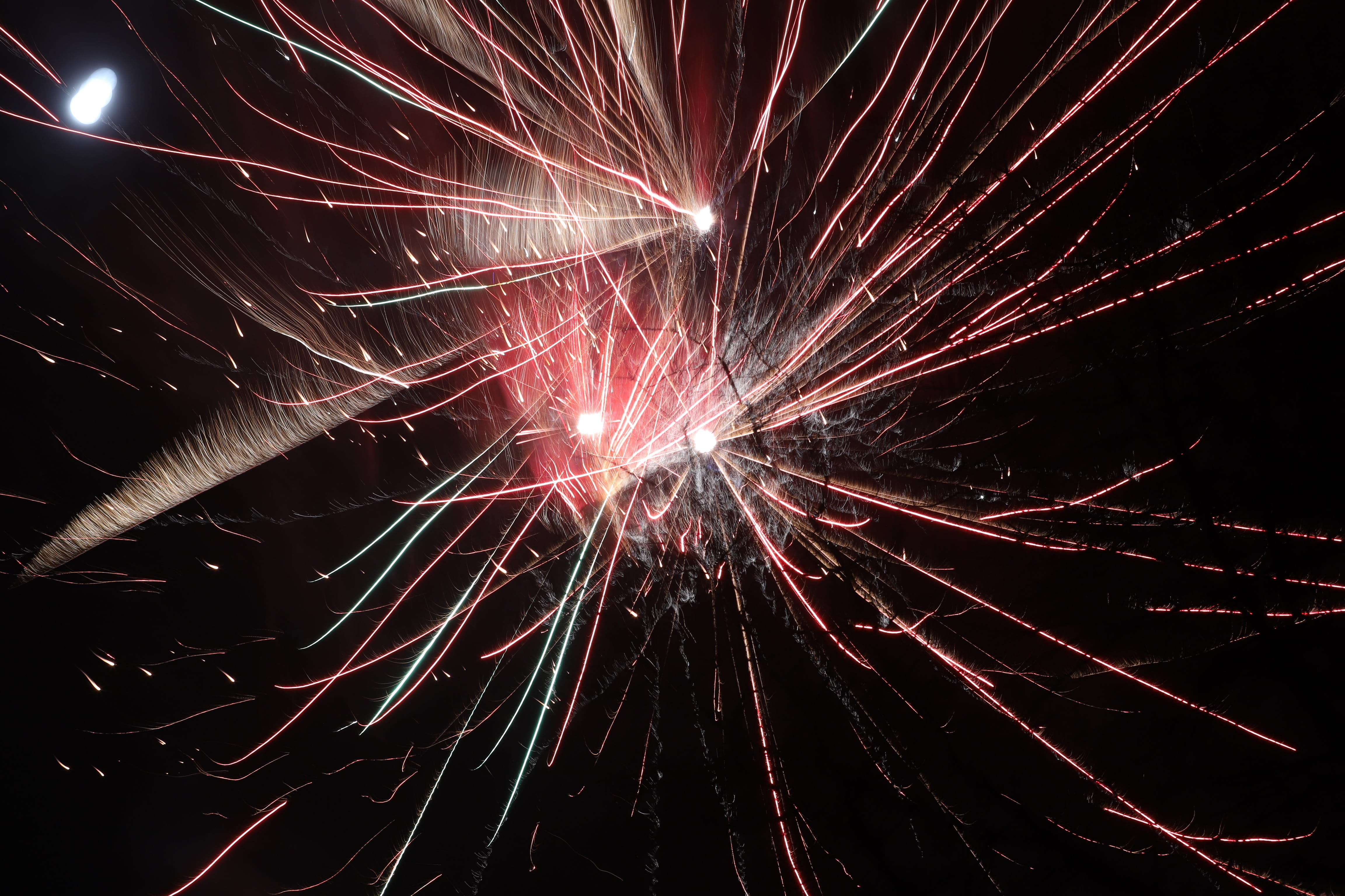 exploding, low angle view, sparks, explosive, black and white, arts culture and entertainment, black background, sky, lijnenspel, backgrounds, structure, HD Wallpaper