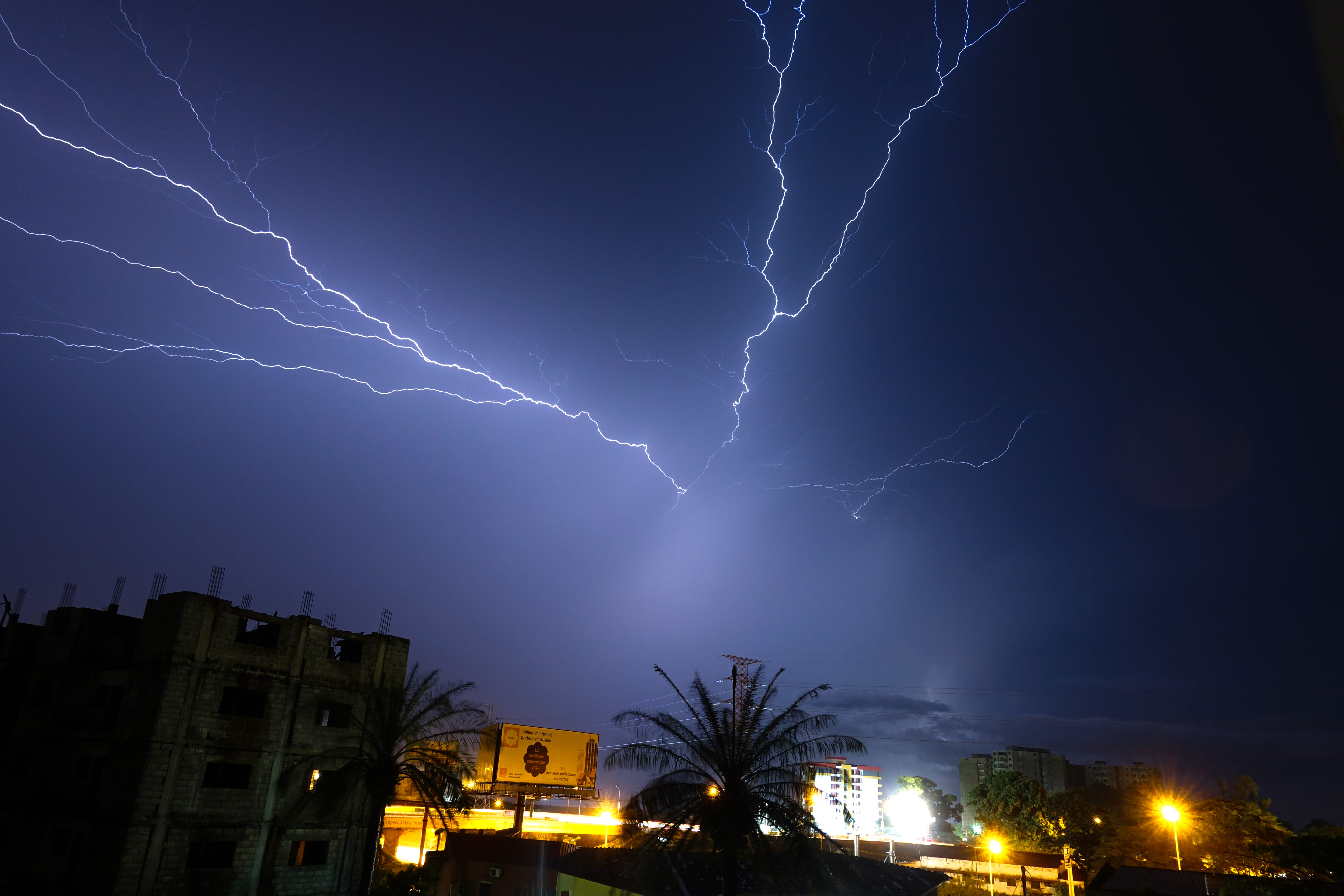 nighttime, power in nature, strike, sky, built structure, tree, nature, flash, extreme weather, city, building exterior, cloud - sky, dark, power, no people, HD Wallpaper
