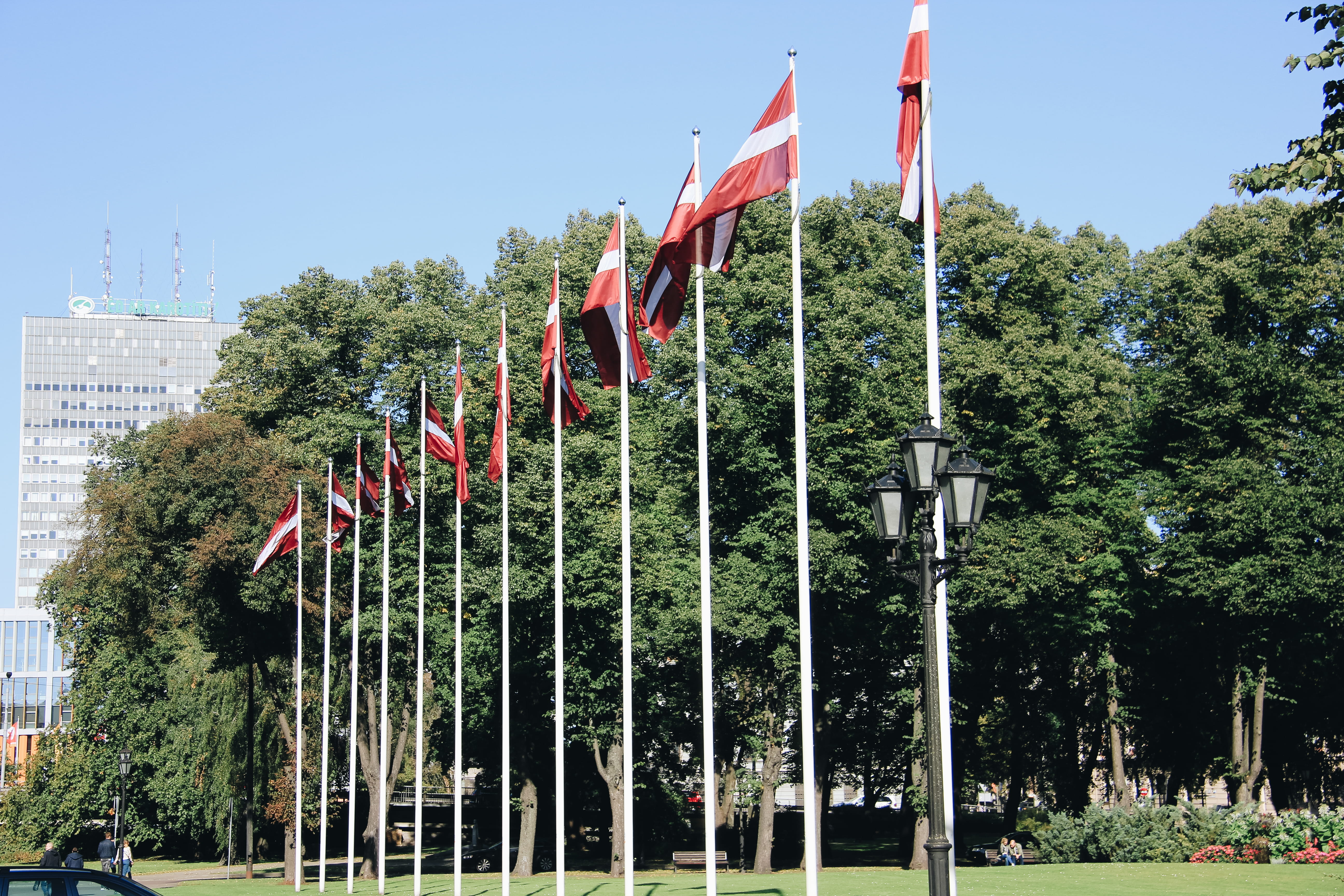 5K, patriotism, building exterior, sky, nature, low angle view, red, plant, flag, tree, pole, architecture, riga, latvia, outdoors, no people, city, independence, HD Wallpaper