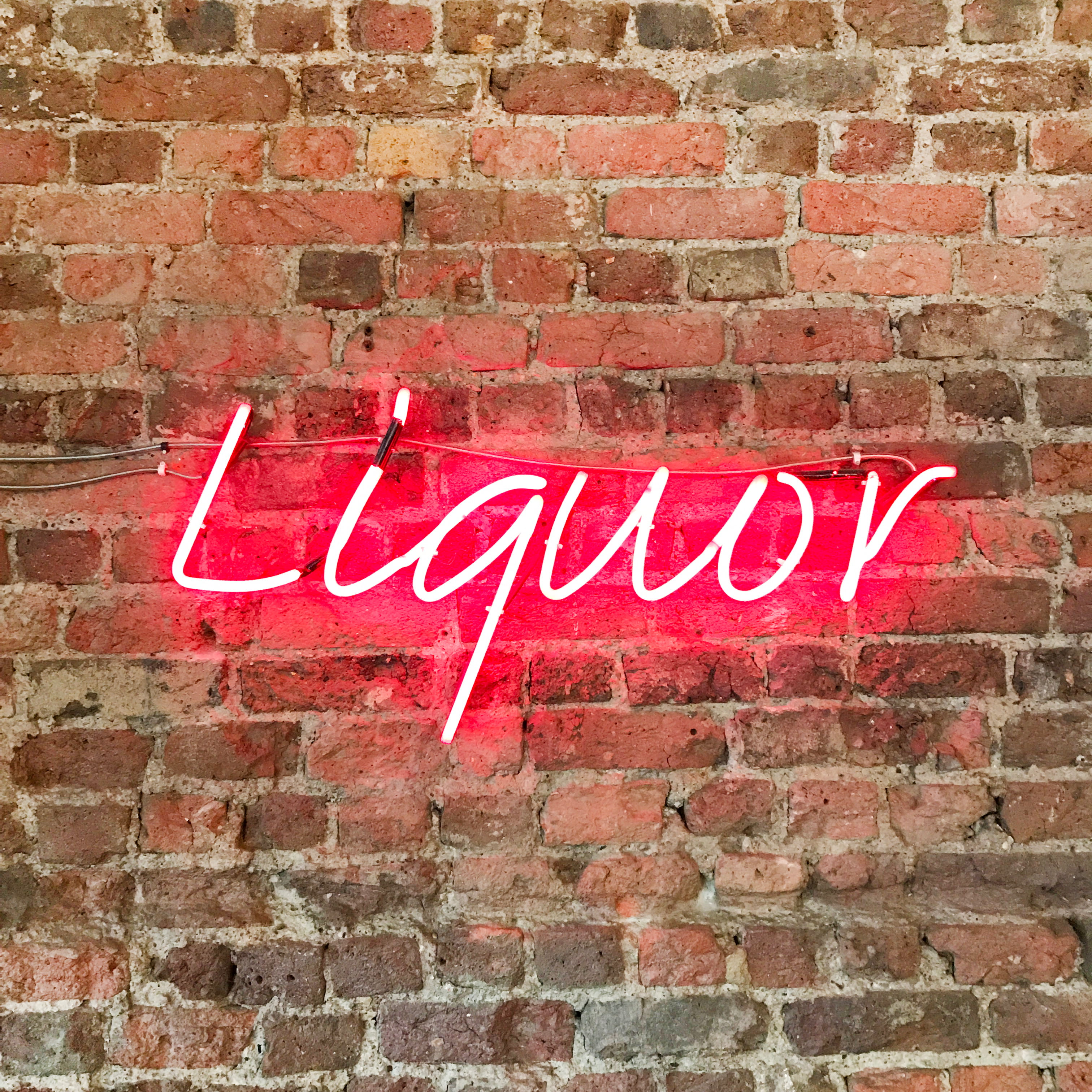 brick Wall, western script, architecture, 2K, tiles, signage, text, texture, bricks, brickwork, capital letter, information, lit, design, message, liquor, Phone HD Wallpaper