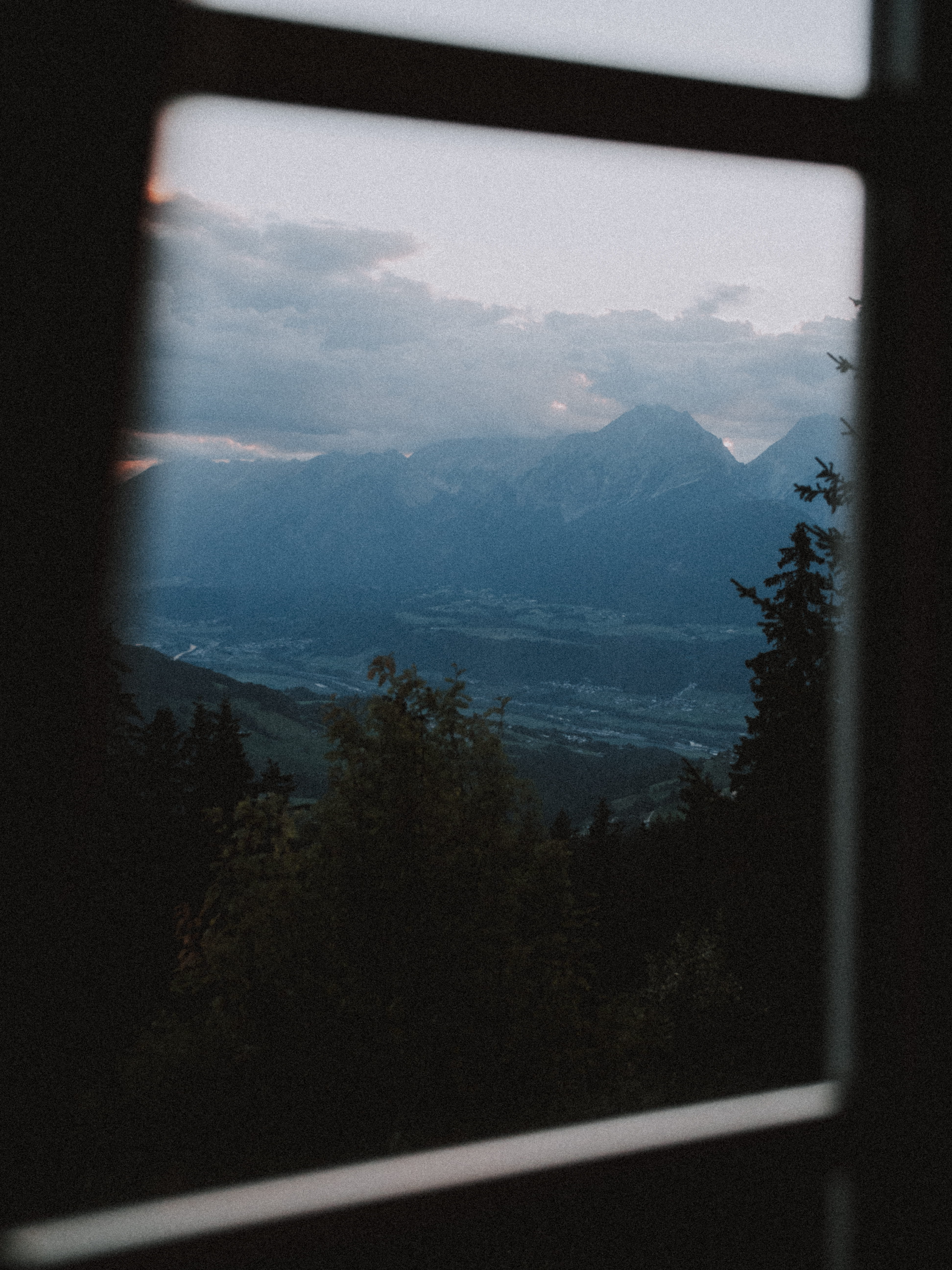 moody, through window, grainy, mountain, dusk, look through, sunset, window, hill, cloud - sky, photography, glass - material, scenics - nature, evening, Phone HD Wallpaper