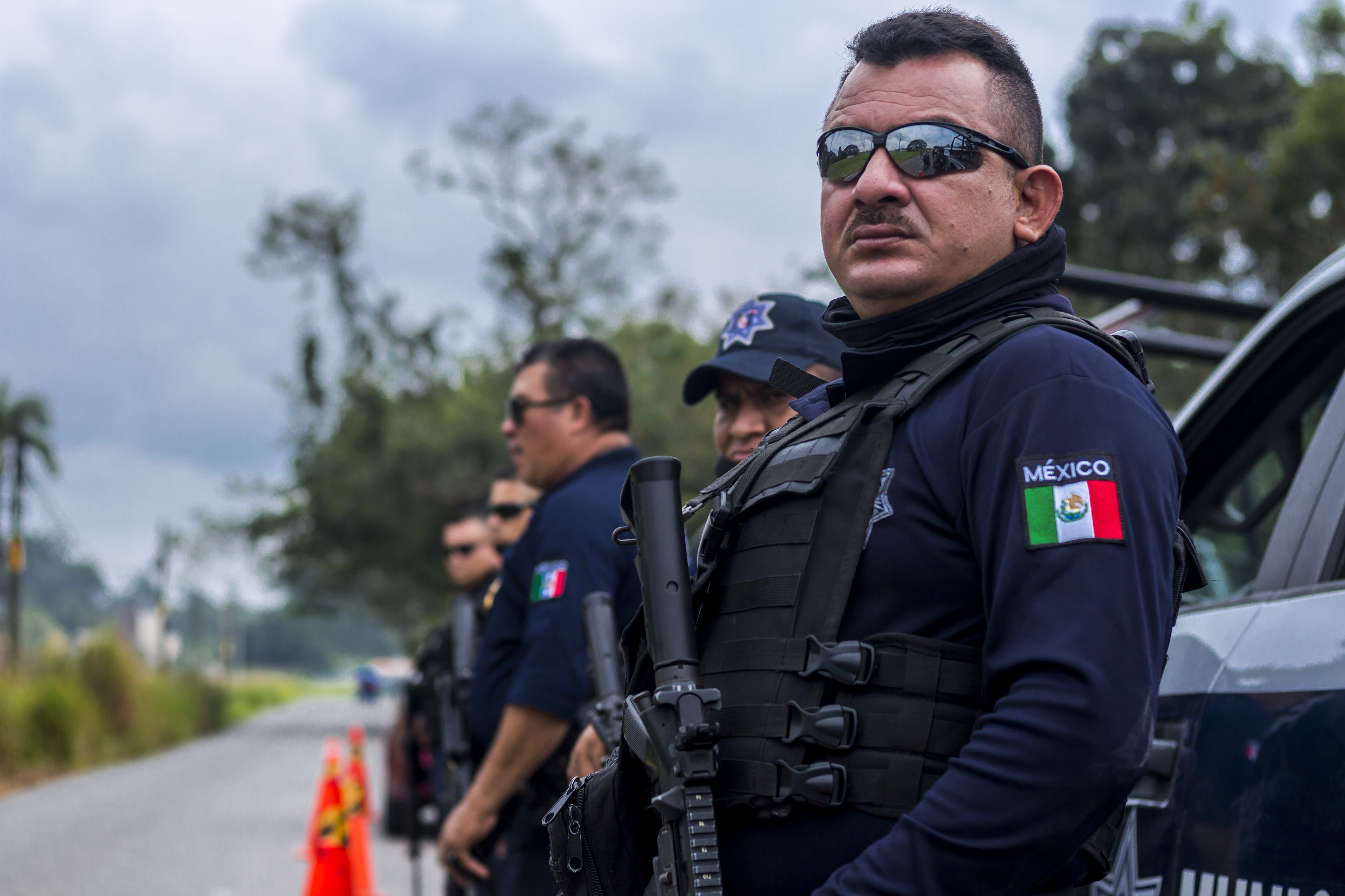 adult, focus on foreground, 5K, law, security, war, monitoring, glasses, police force, people, safety, authority, gun, protection, clothing, police, mature men, HD Wallpaper