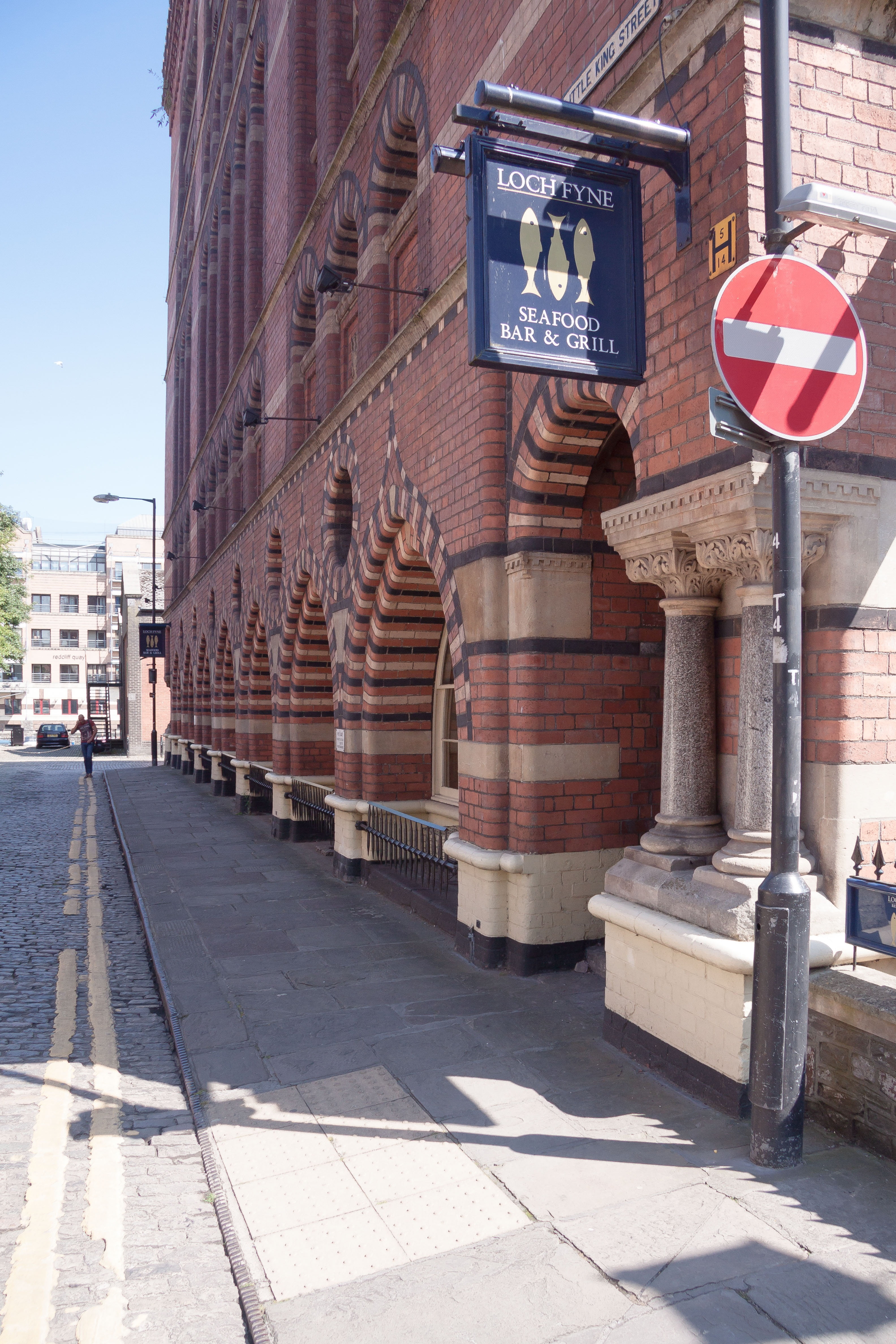 city, transportation, archways, sunlight, no people, restaurant, england, nature, facade, building exterior, sign, direction, building, architectural column, Phone HD Wallpaper