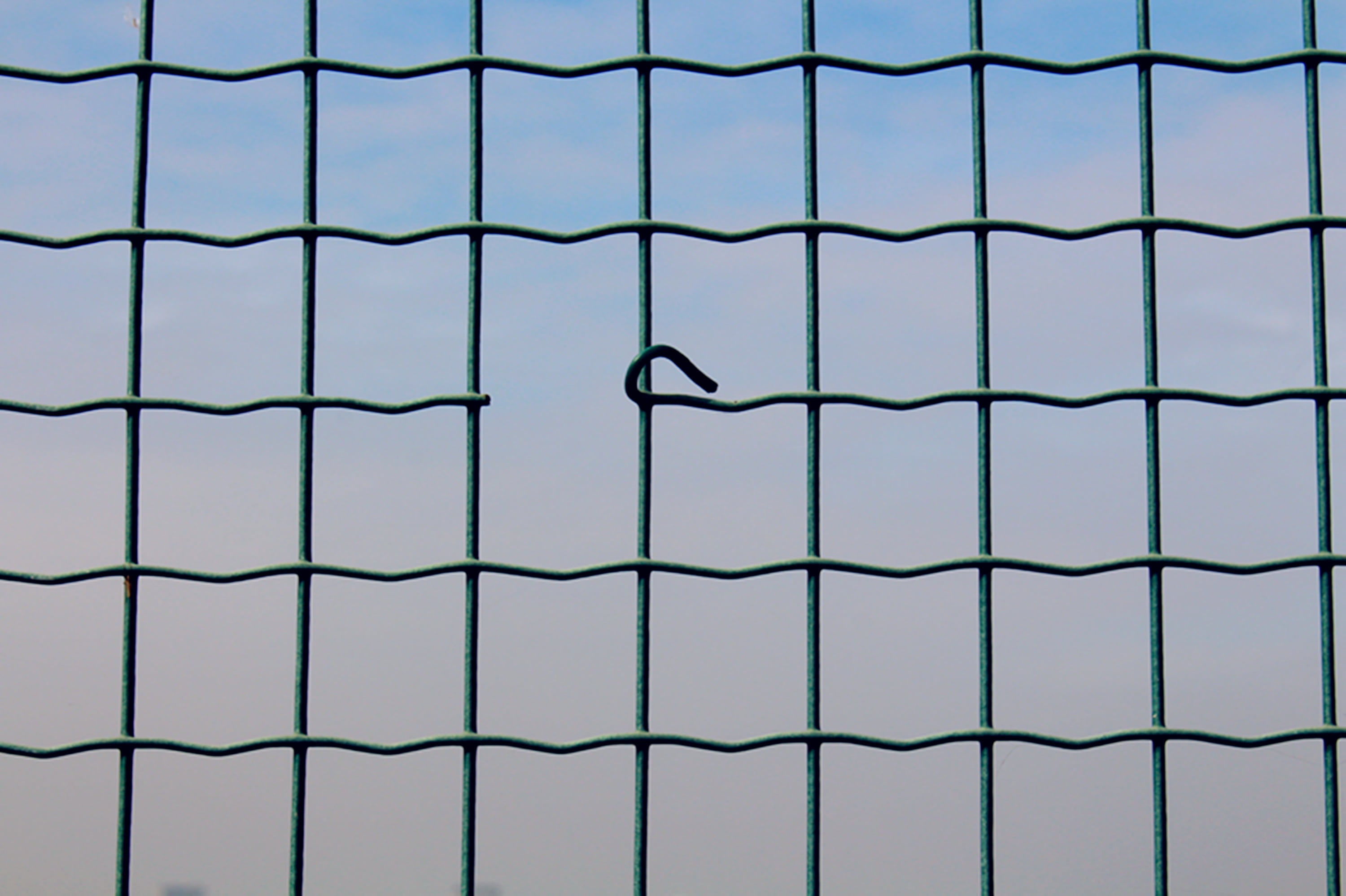 fences, safety, sport, no people, pattern, sky, barrier, 2K, boundary, wire, full frame, day, protection, brocken, green color, security, nature, fence, HD Wallpaper
