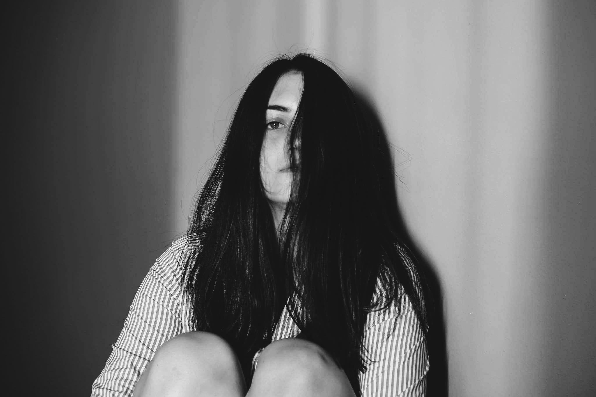 black and white, depression - sadness, distinction, a lone, face, 1080P, young women, long hair, sadness, hairstyle, tired of the, adult, sitting, women, HD Wallpaper
