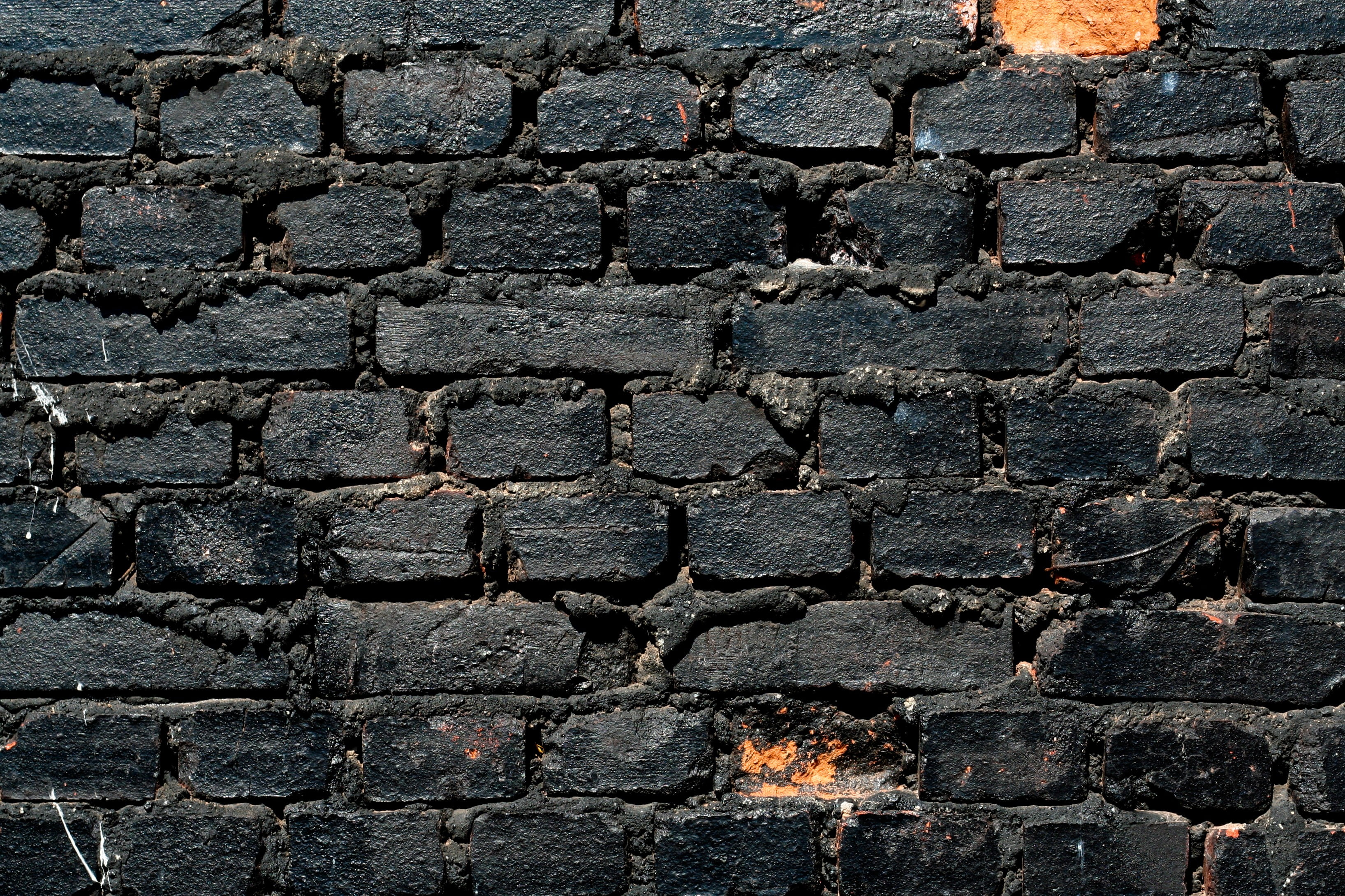 close-up, brick wall, weathered, nature, wall, outdoors, stone wall, architecture, black, no people, 2K, solid, backgrounds, pattern, brick, built structure, HD Wallpaper