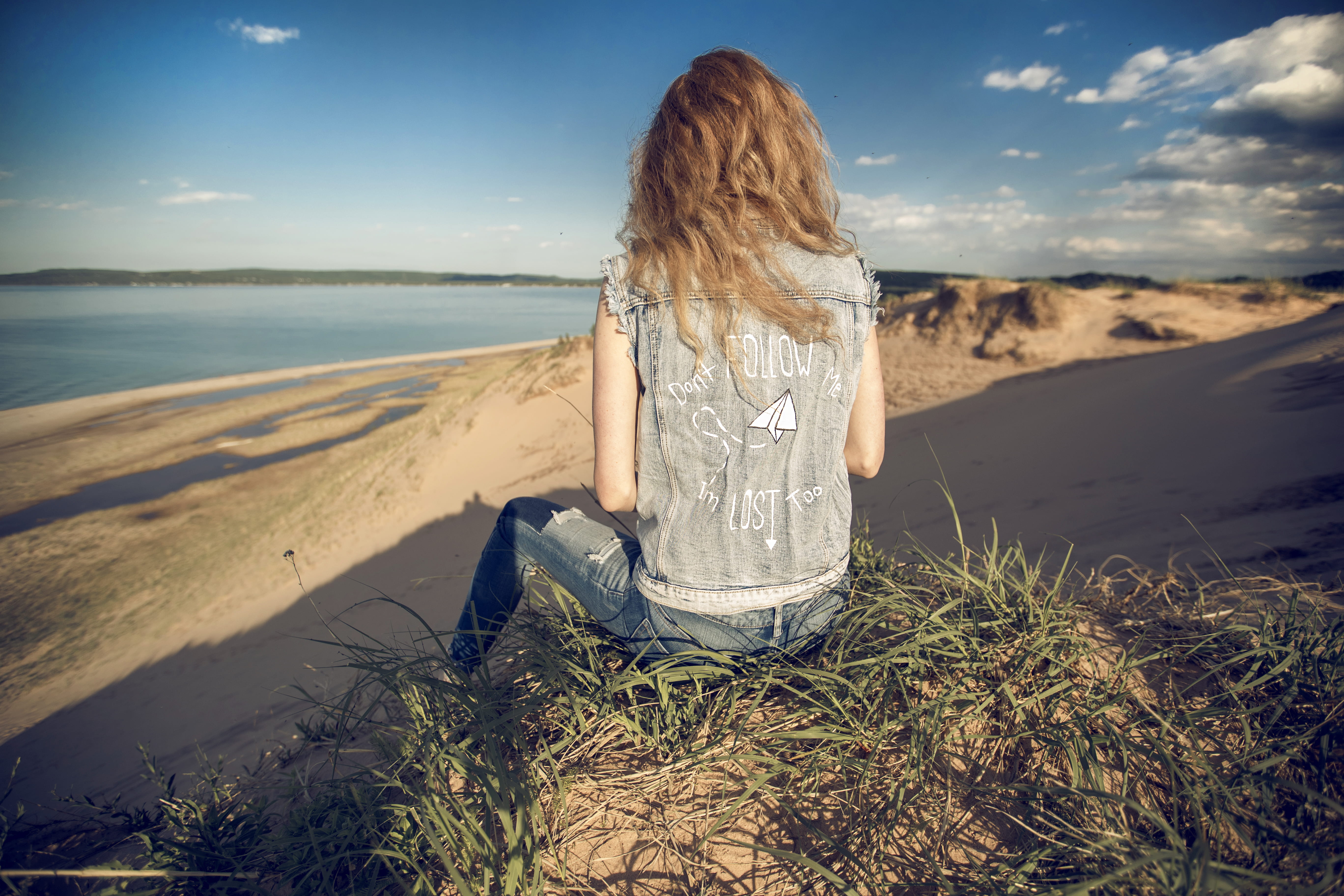 woman, looking out, wanderlust, jean jacket, sleeping bear sand dune, nature, cloud, one person, seashore, sand dune, hairstyle, beauty in nature, water, HD Wallpaper