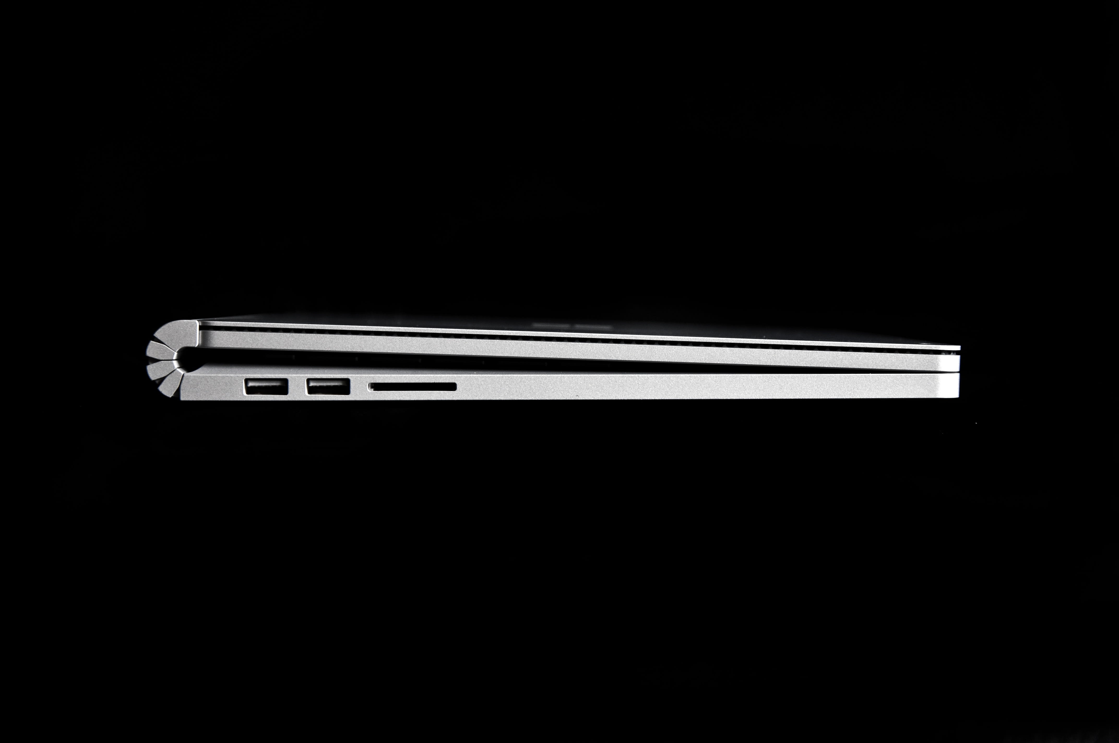 black color, close-up, single object, laptop, closed, surface book, white color, fluorescent light, black background, lighting equipment, usb connection, HD Wallpaper