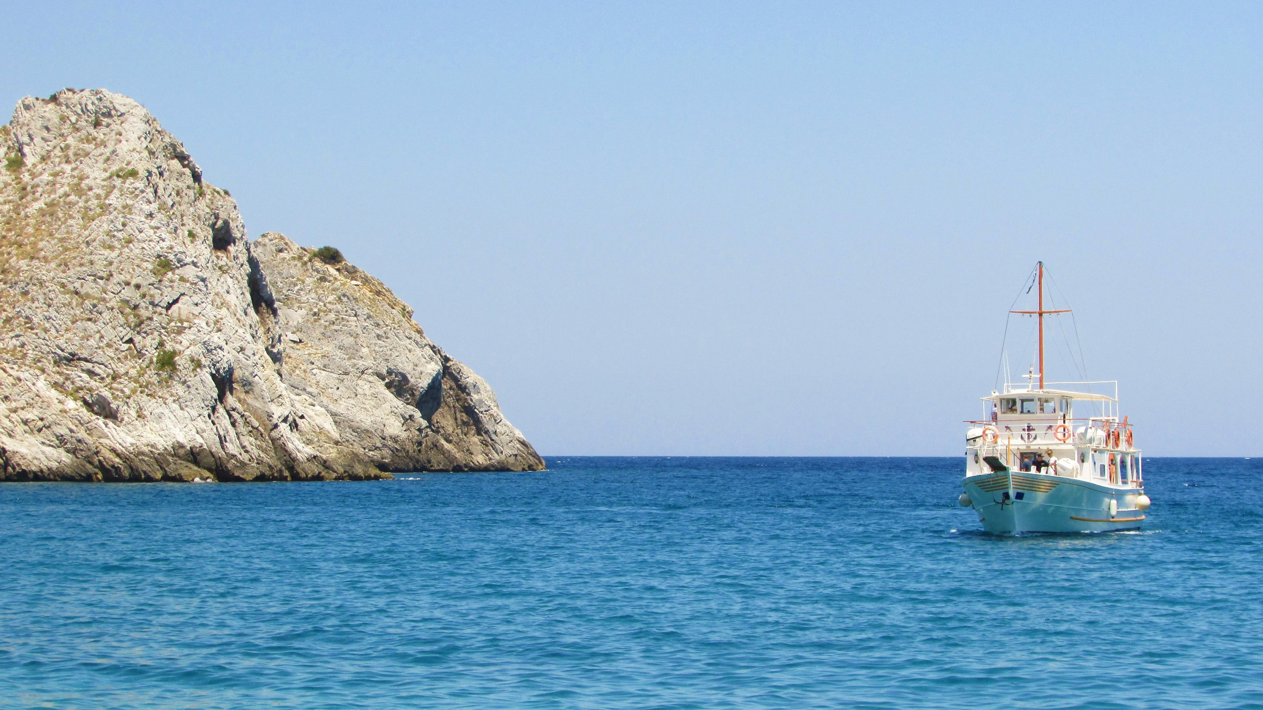 nature, rock, land, no people, rocky coast, anchored, 4K, Skiathos, clear sky, coastline, landscape, sky, sea, island, day, beauty in nature, blue, passenger craft, HD Wallpaper