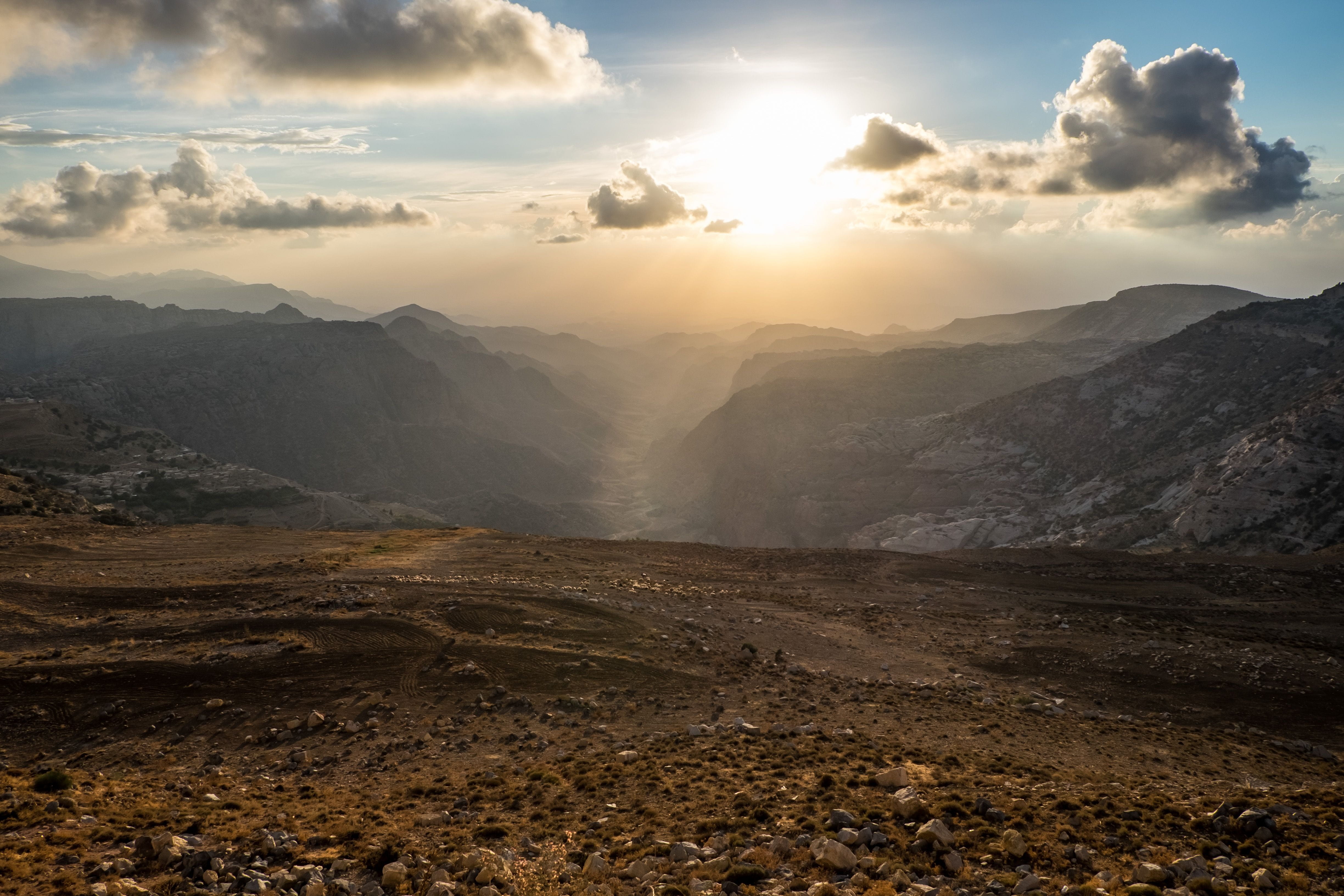 travel destinations, cloud - sky, sun, jordan, land, sunlight, mountain, mountain range, beauty in nature, environment, no people, tranquil scene, wadi dana, HD Wallpaper