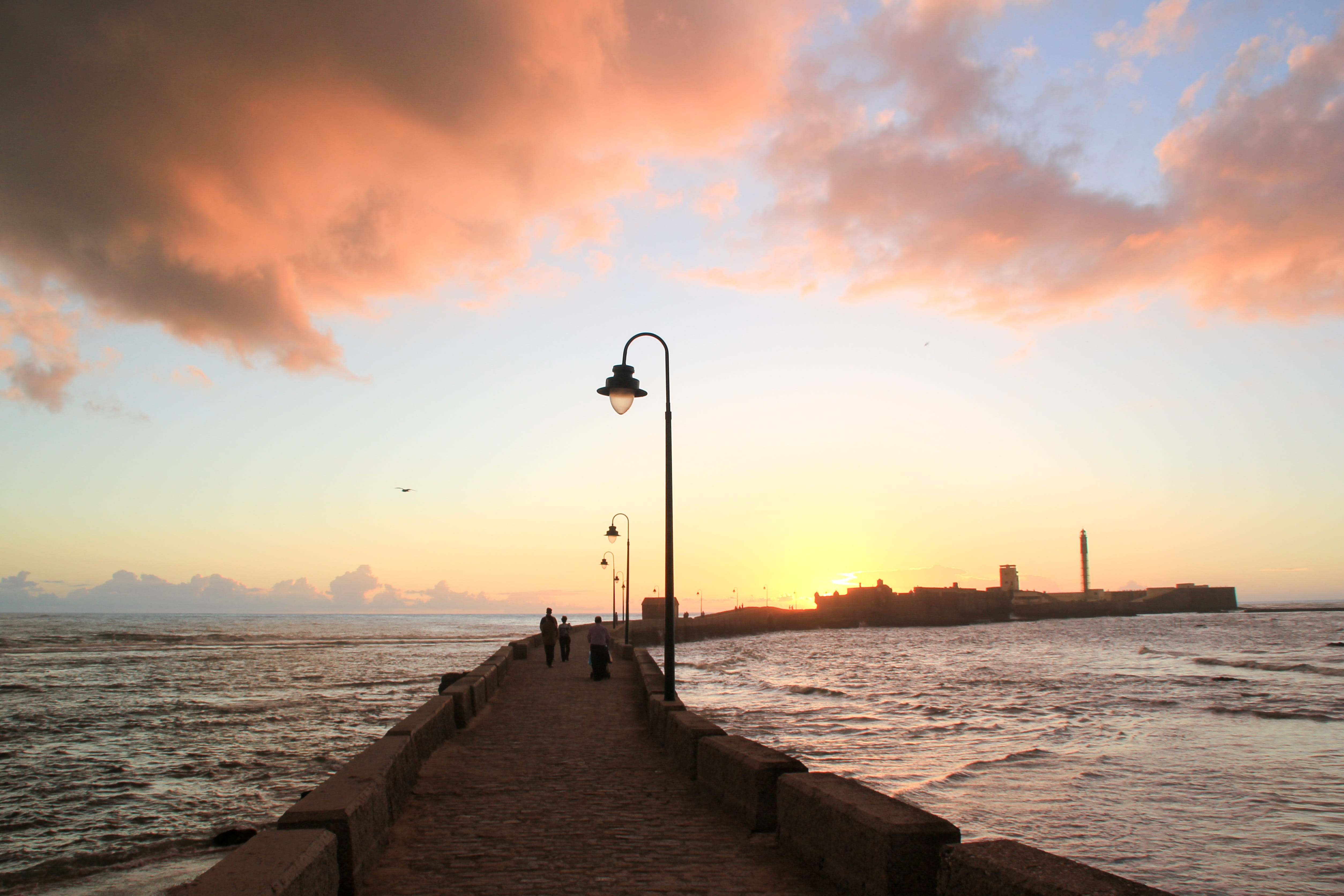 sun, sunset, outdoors, built structure, landscape, city, tranquil scene, monument, andalusia, orange sky, pier, costa, spain, scenics - nature, 4K, sea, HD Wallpaper