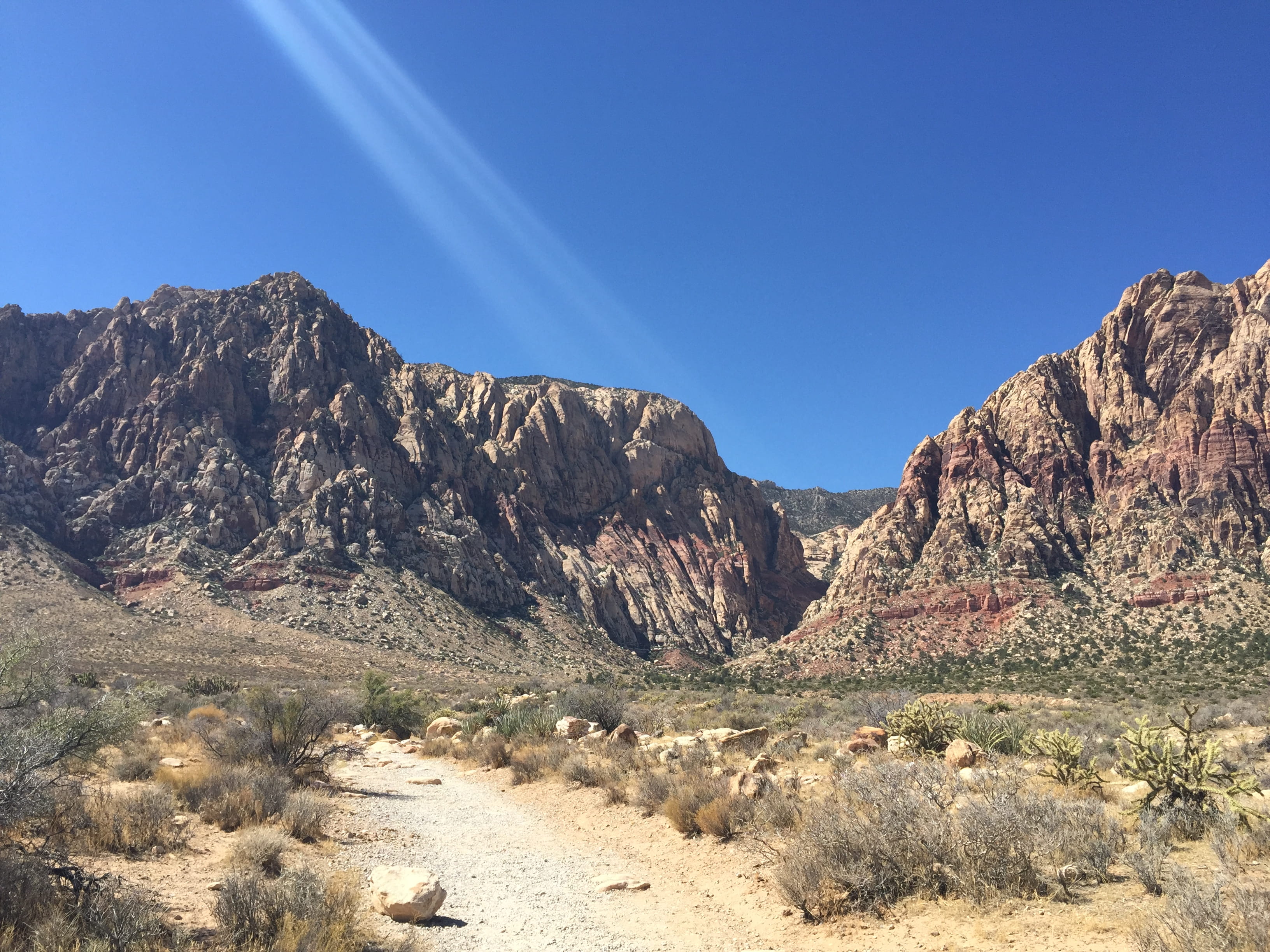 red rock, red rock national park, mountain range, 2K, day, tranquil scene, no people, light beam, formation, beauty in nature, desert, sunlight, clear sky, HD Wallpaper