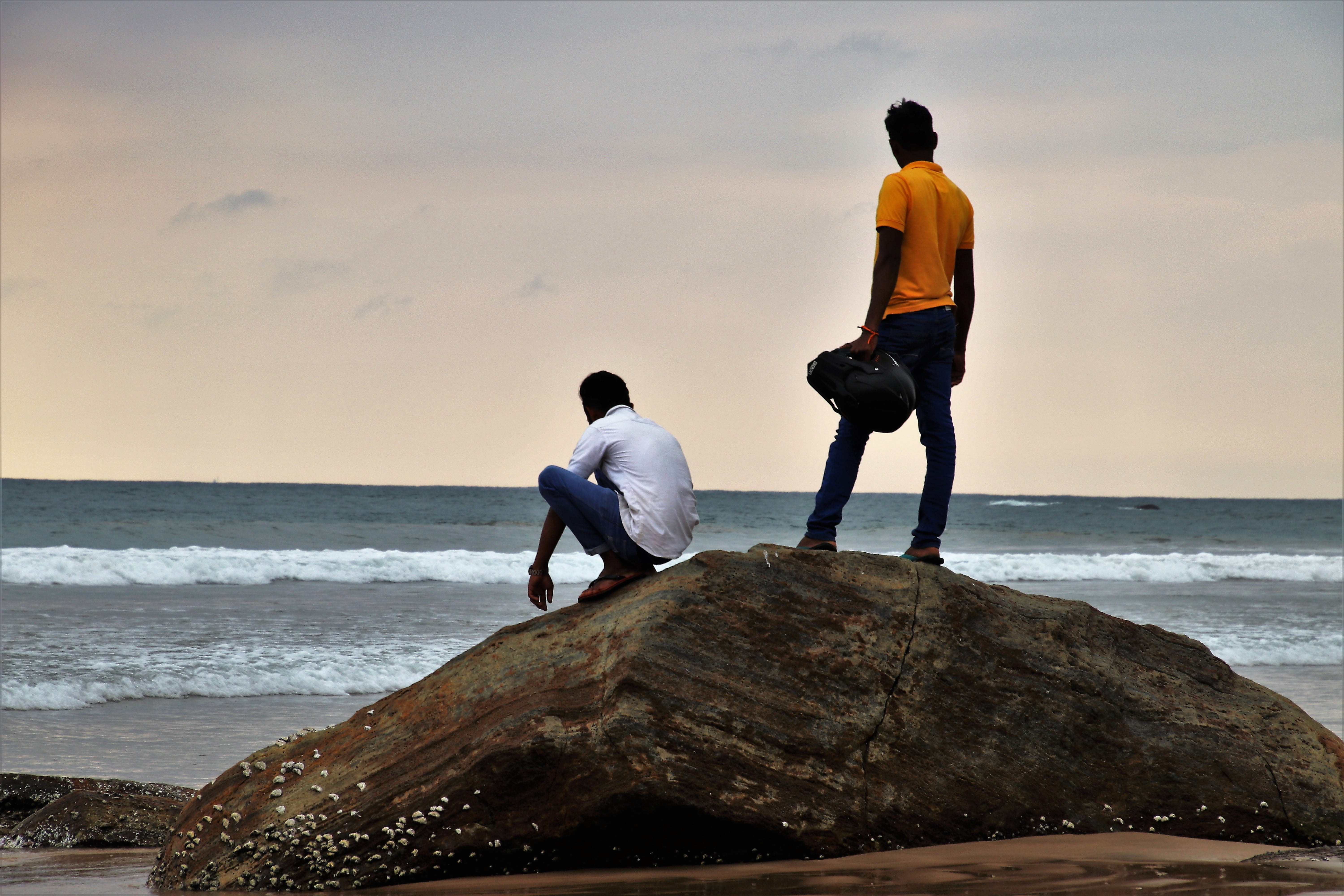 sand, friends, ocean, rock - object, sea, men, monolithic part of the waters, wind, travel, people, beach, pants, the person, holiday, nature, relax, leisure activity, HD Wallpaper