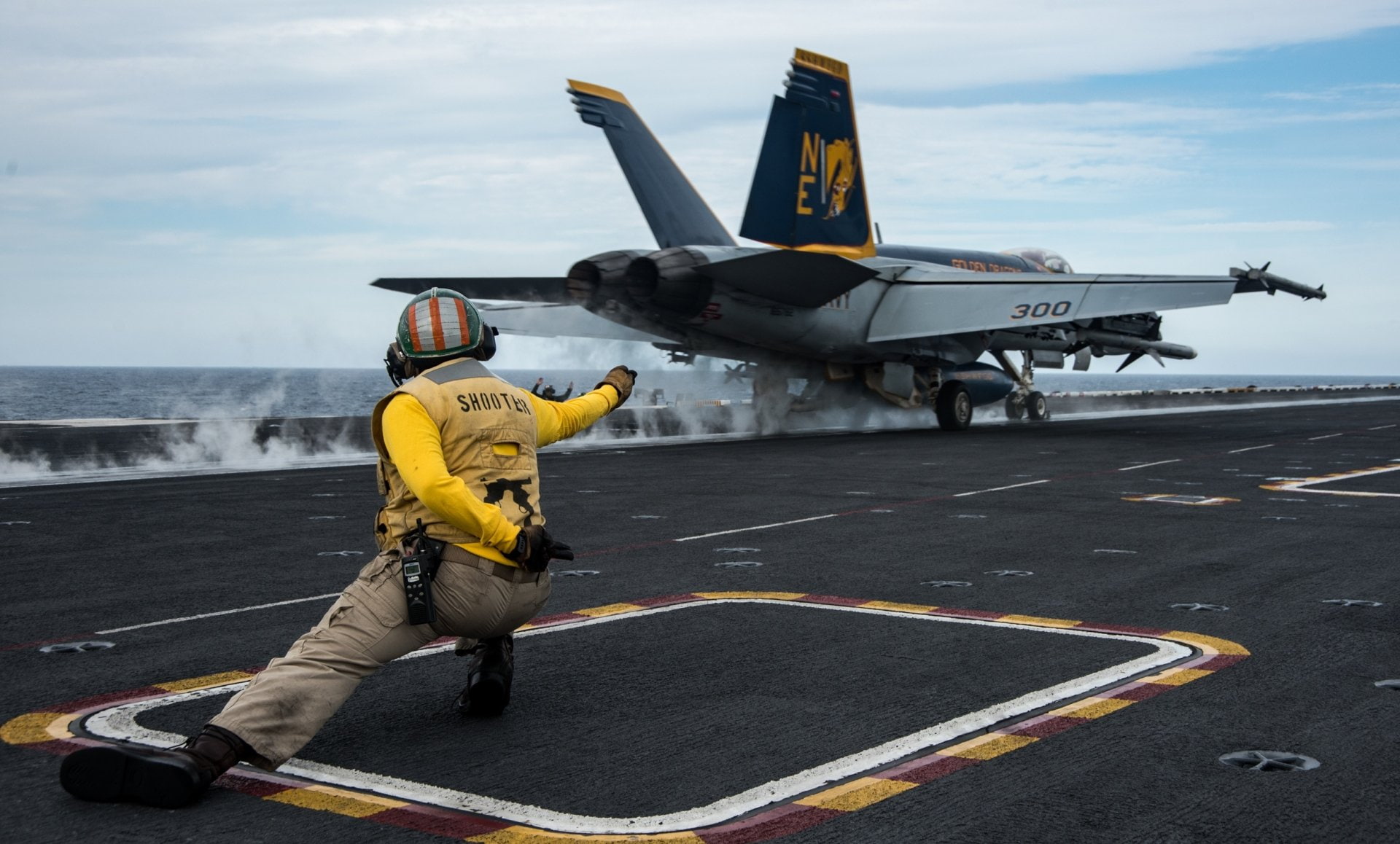 McDonnell Douglas F/A-18 Hornet, real people, Aircraft, air vehicle, plane, sky, yellow, fighter plane, mode of transportation, cloud - sky, outdoors, arms raised, HD Wallpaper