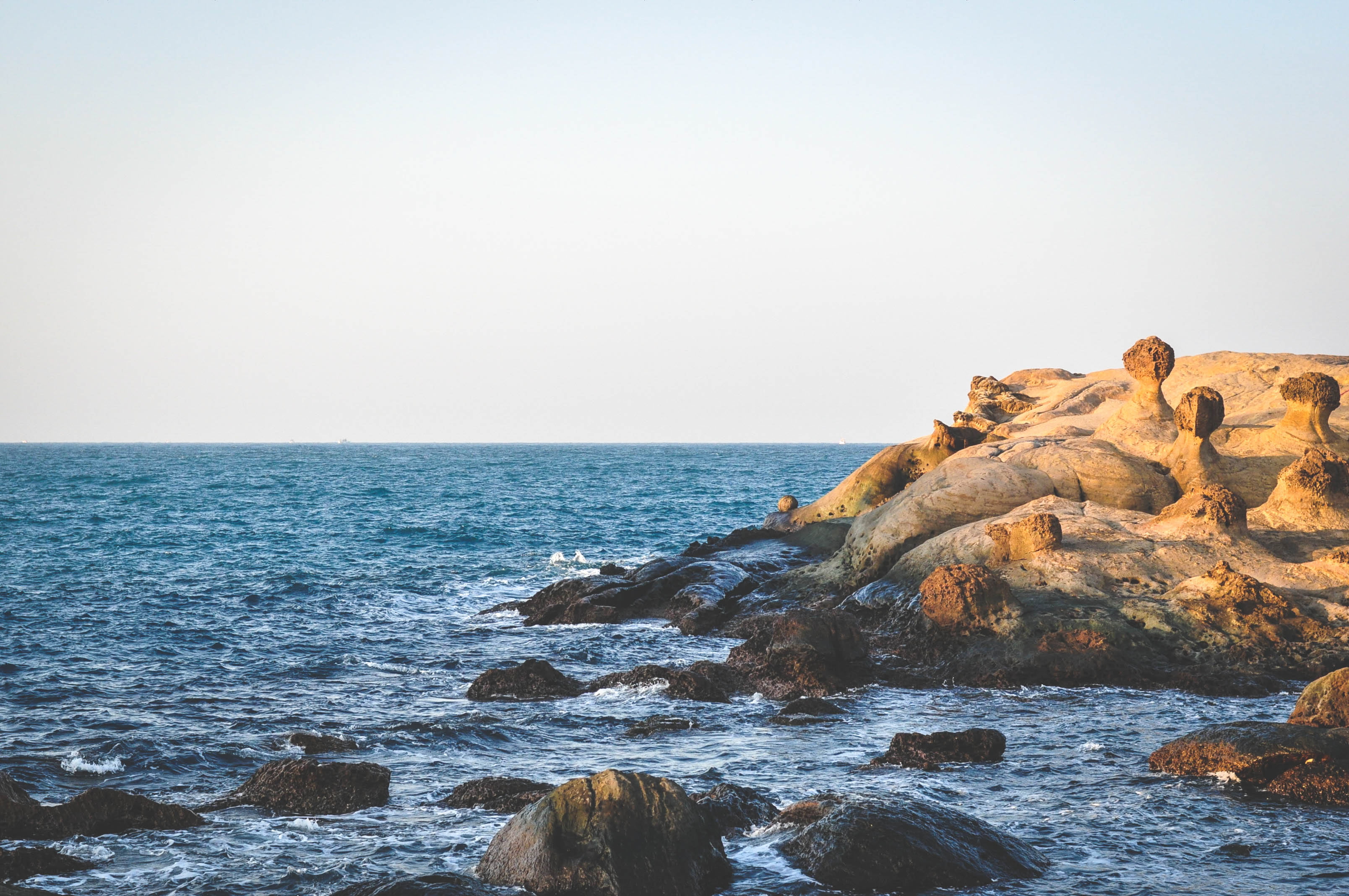 boulders, scenics, near, Taiwan, land, ocean, brown, horizon, nature, water, rock, rocks, body, daytime, sky, overlooking, scenics - nature, horizon over water, HD Wallpaper